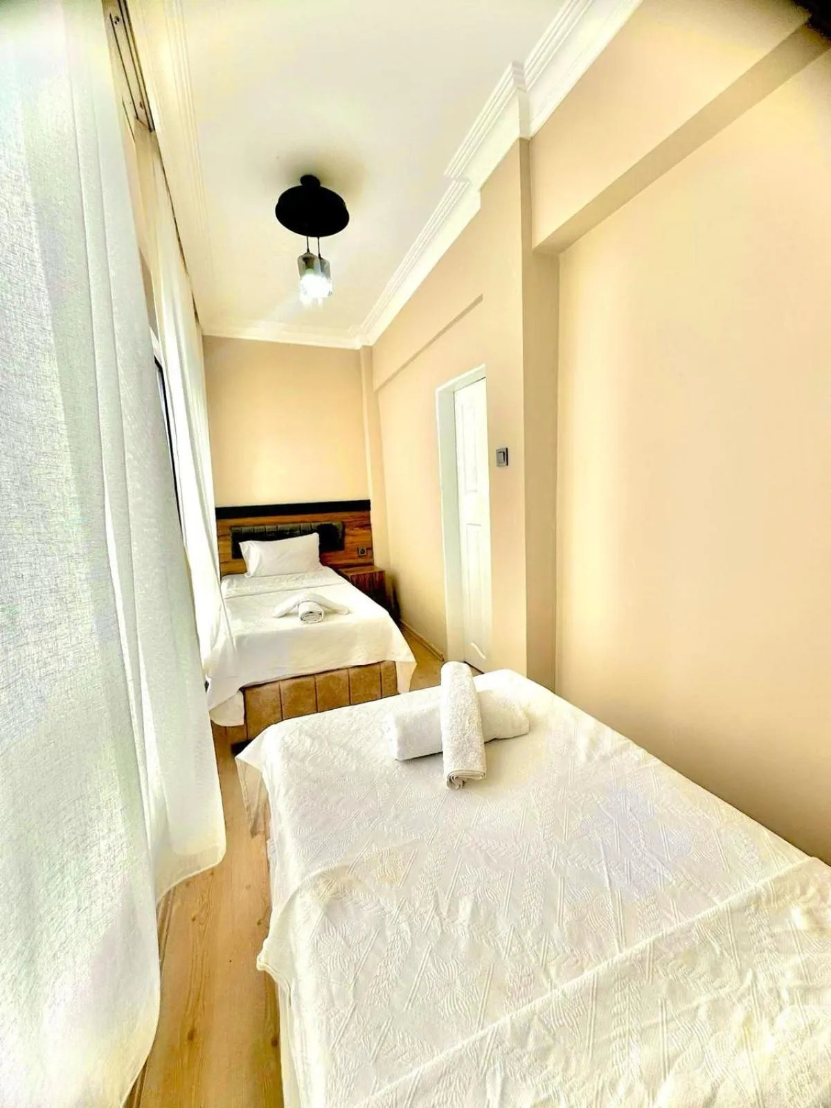 Bed in Grand Lavin Hotel