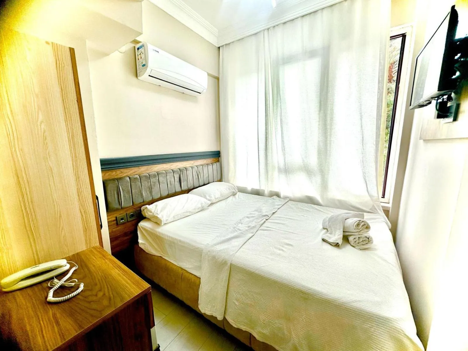 Bed in Grand Lavin Hotel