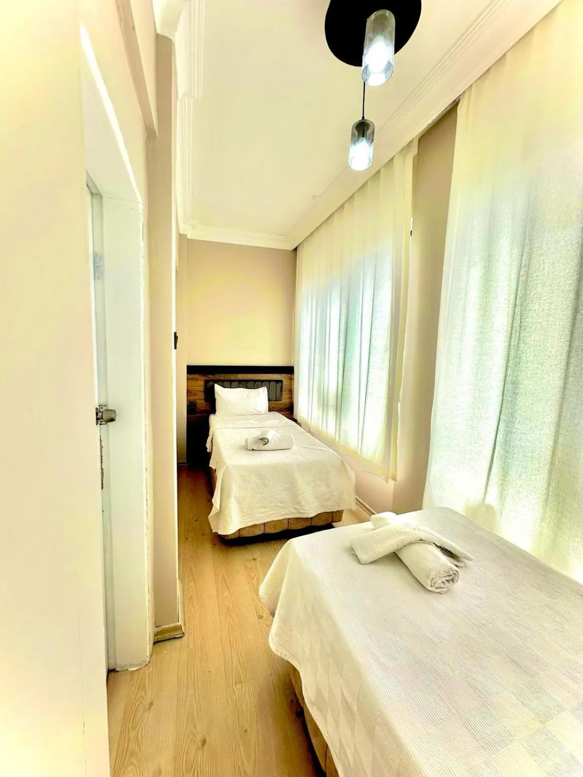 Bed in Grand Lavin Hotel