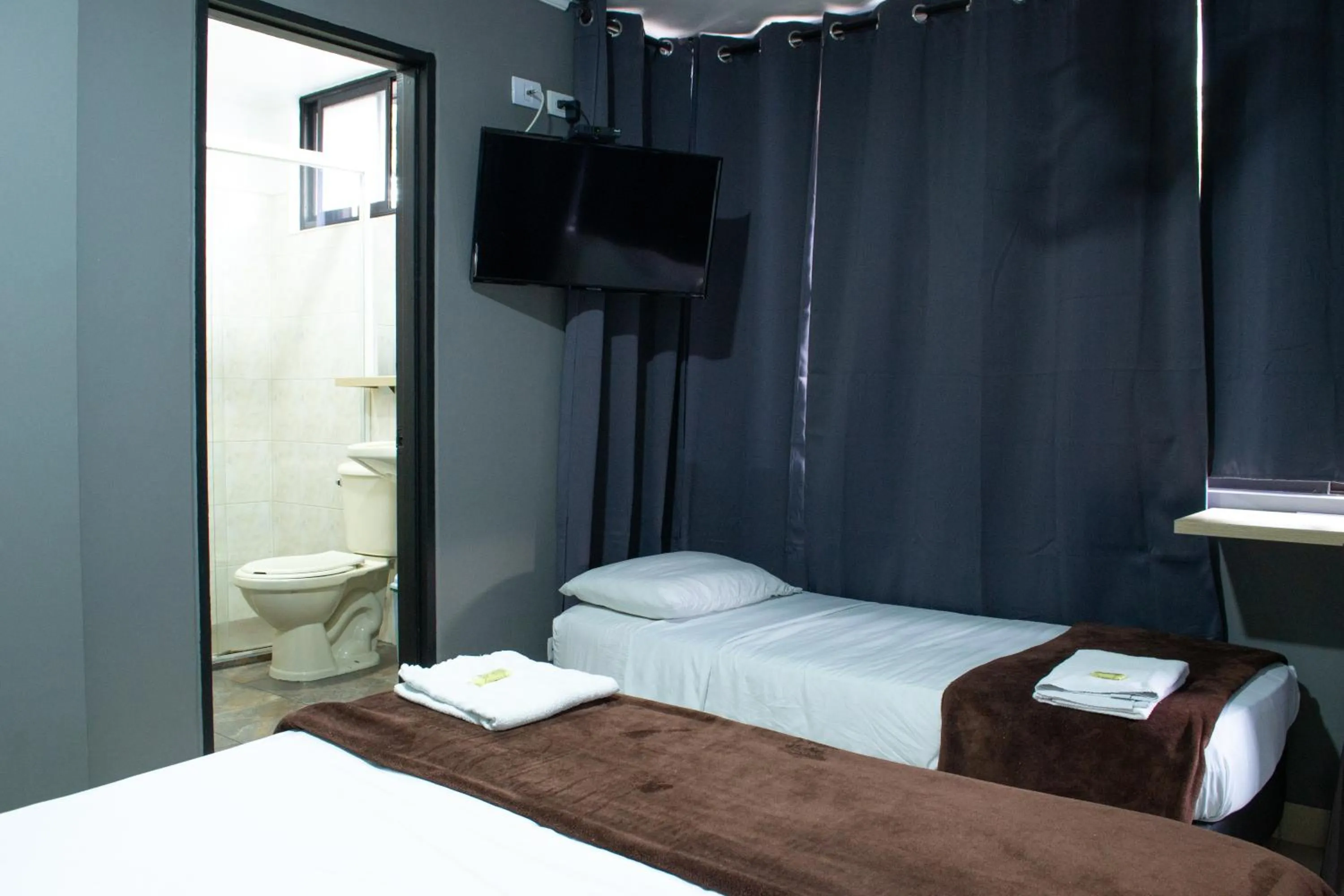 Bed in Hotel Ruiseñor Itagui