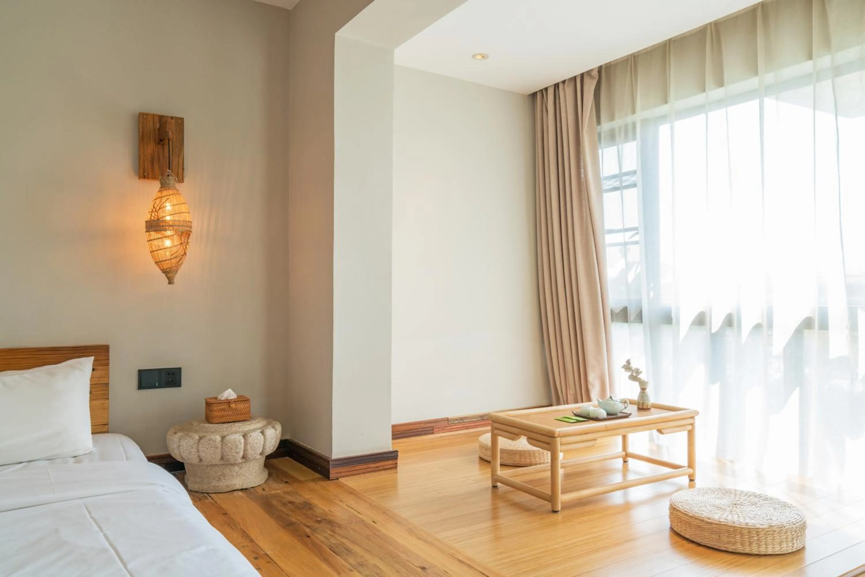 Seating area, Bed in Zen Tea House Seven Stars Park