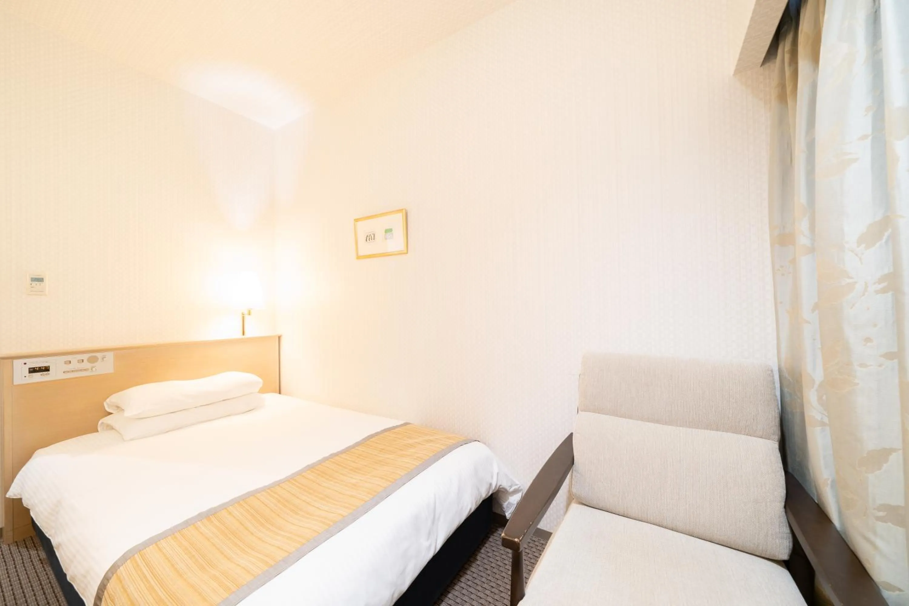 Bed in Hotel Terrace The Square Hitachi