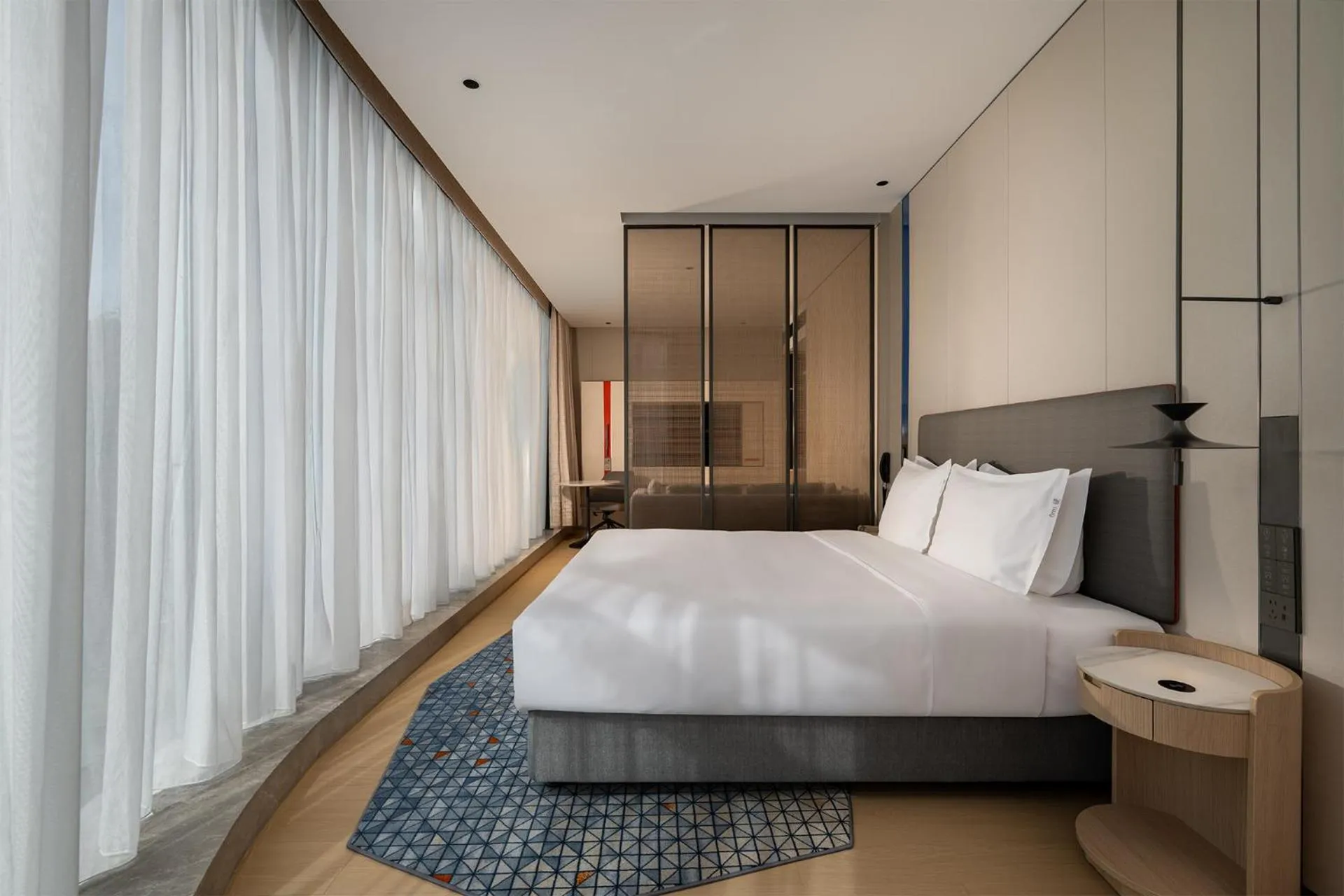 Bed in Holiday Inn Express Shenzhen Sports Center by IHG