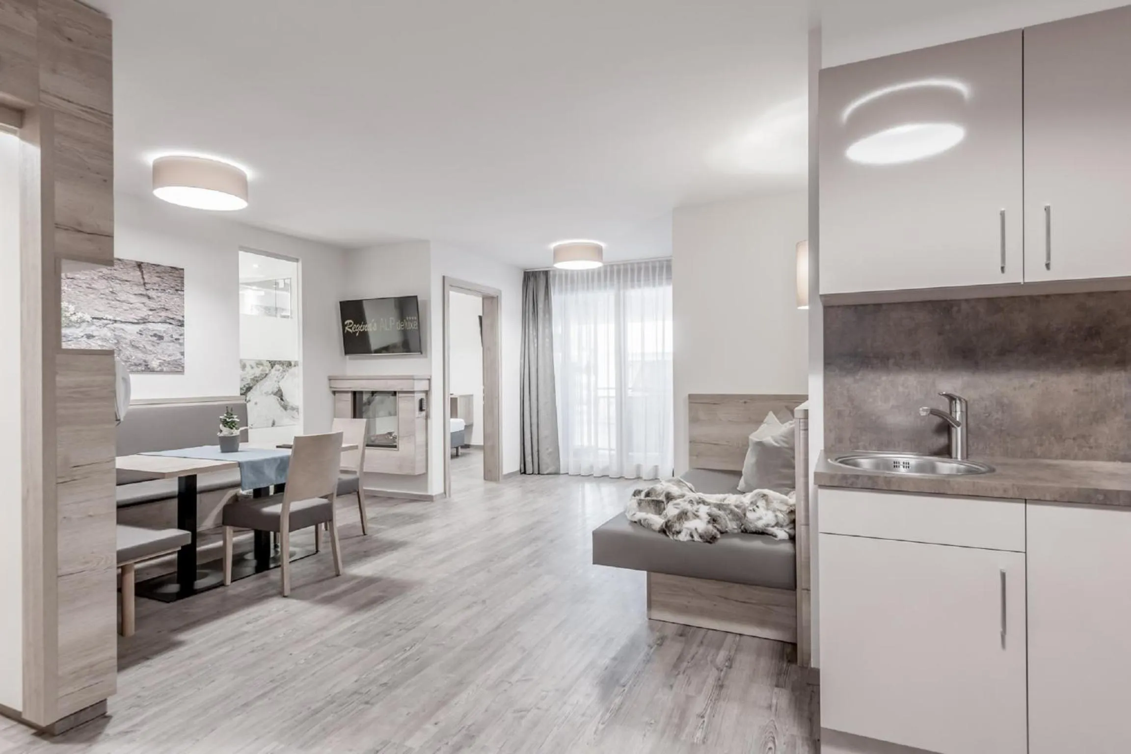 Living room in The Deluxe by Regina