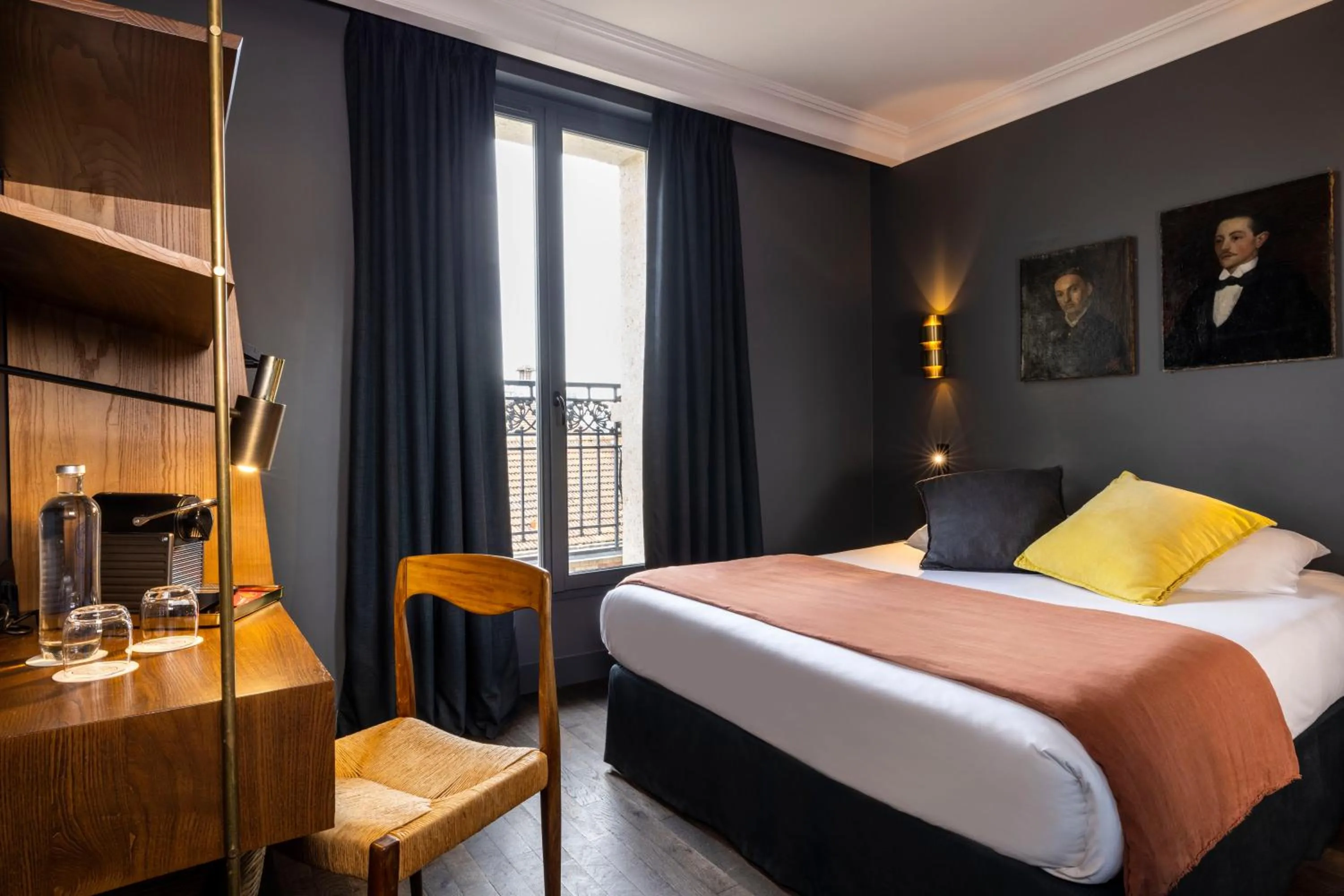 Bed in COQ Hotel Paris