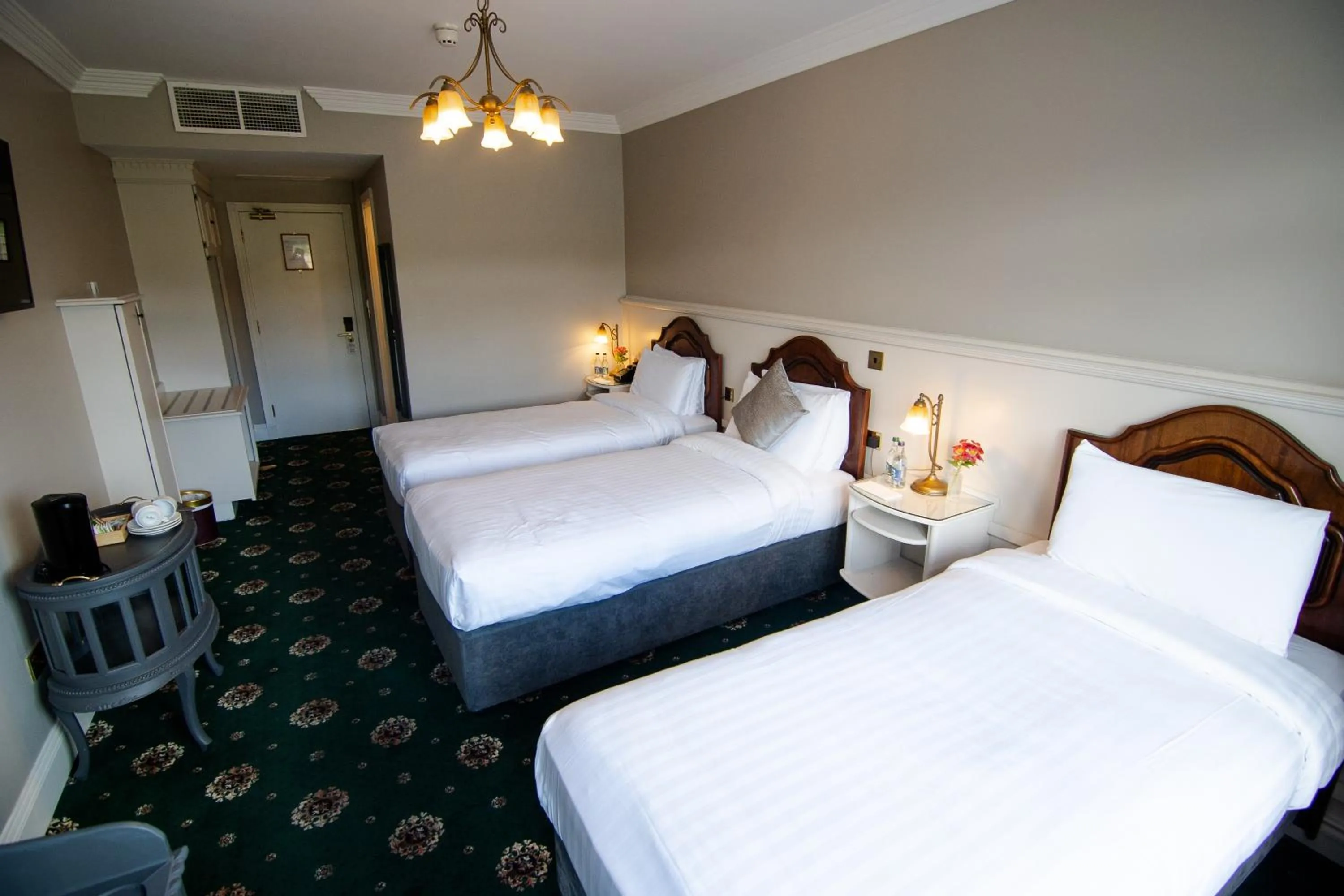 Bed in Lakeside Manor Hotel