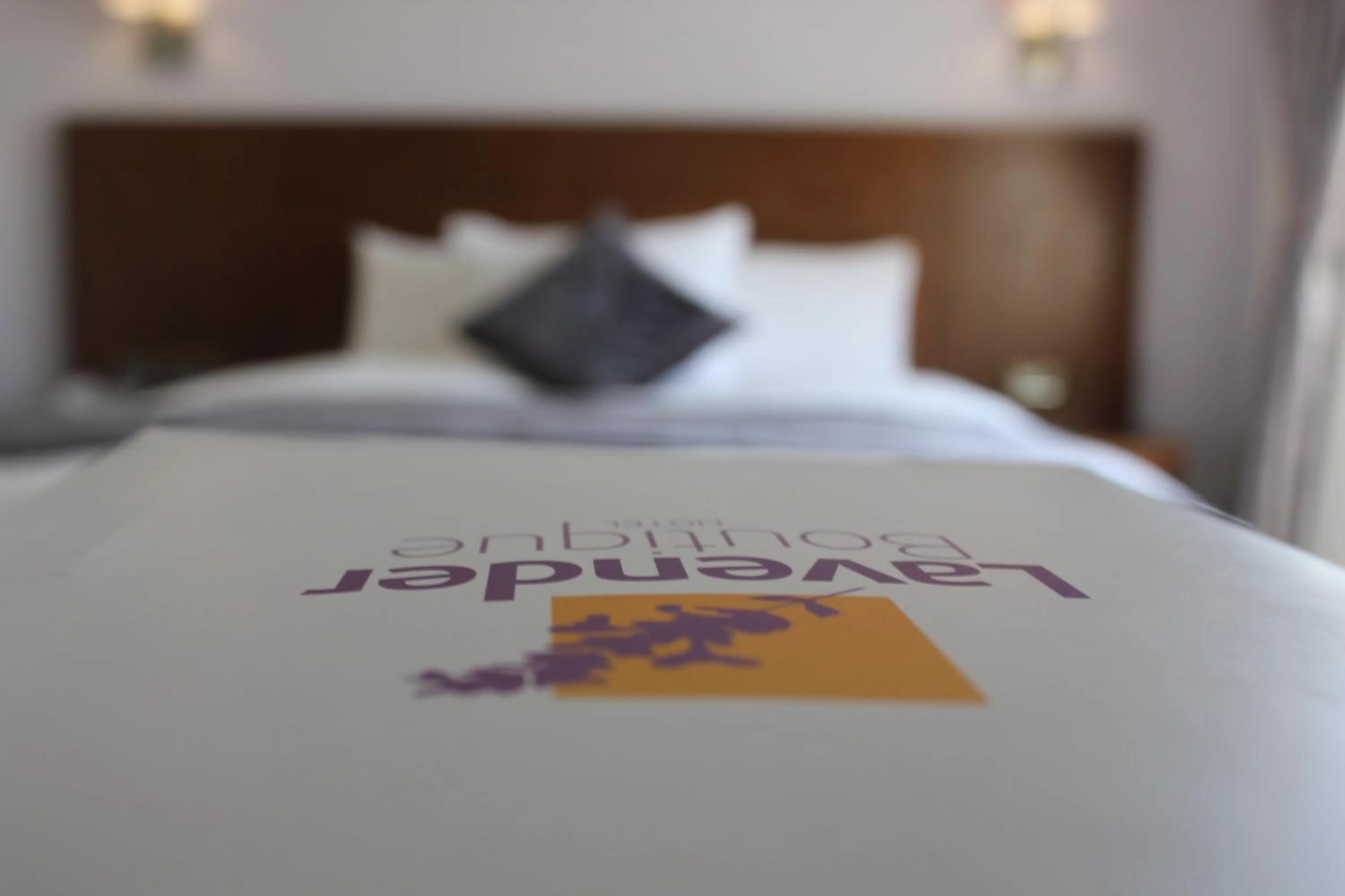 Bed in Lavender Boutique Hotel