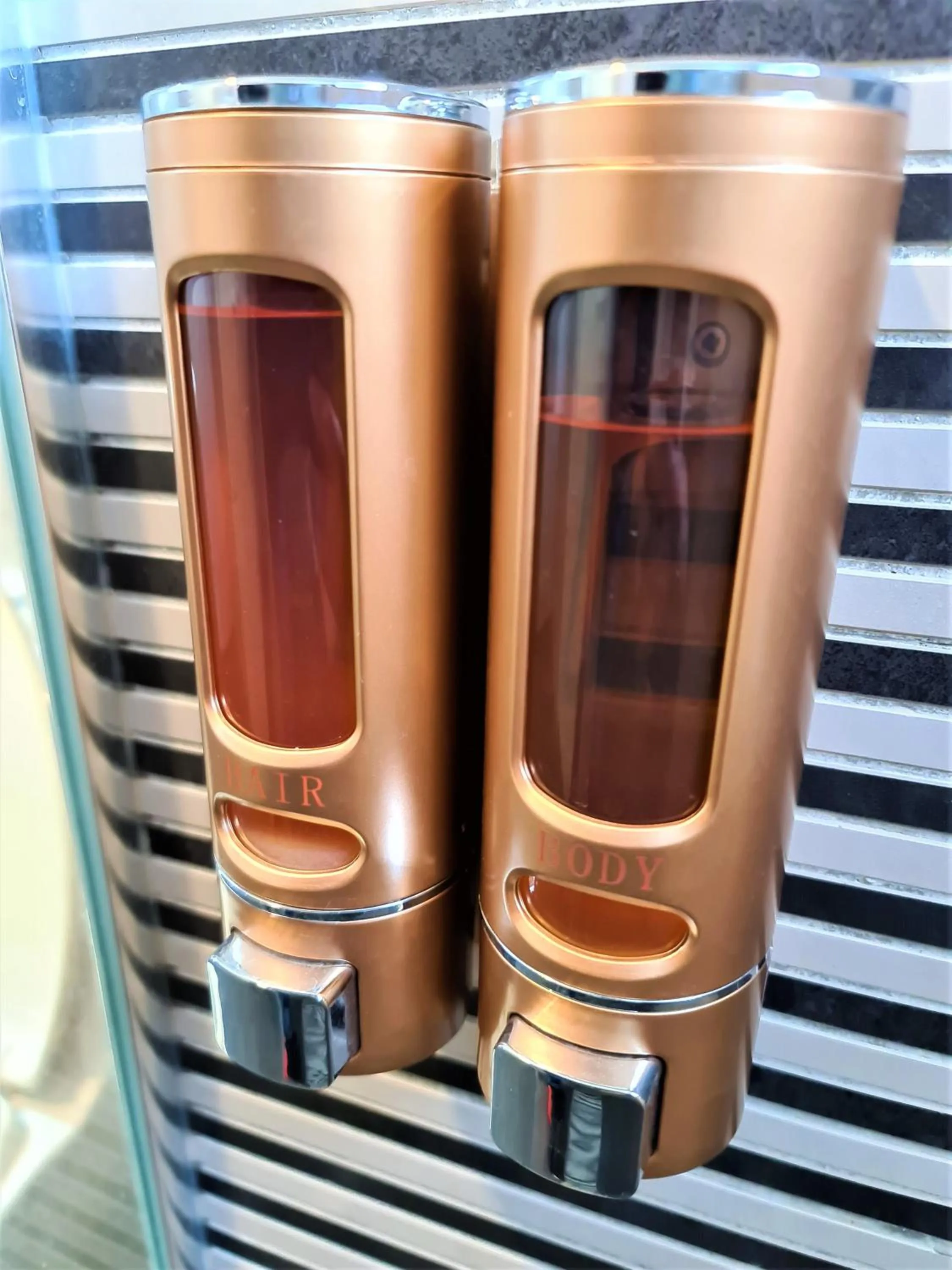 Toilet in Nexus Business Suite Hotel