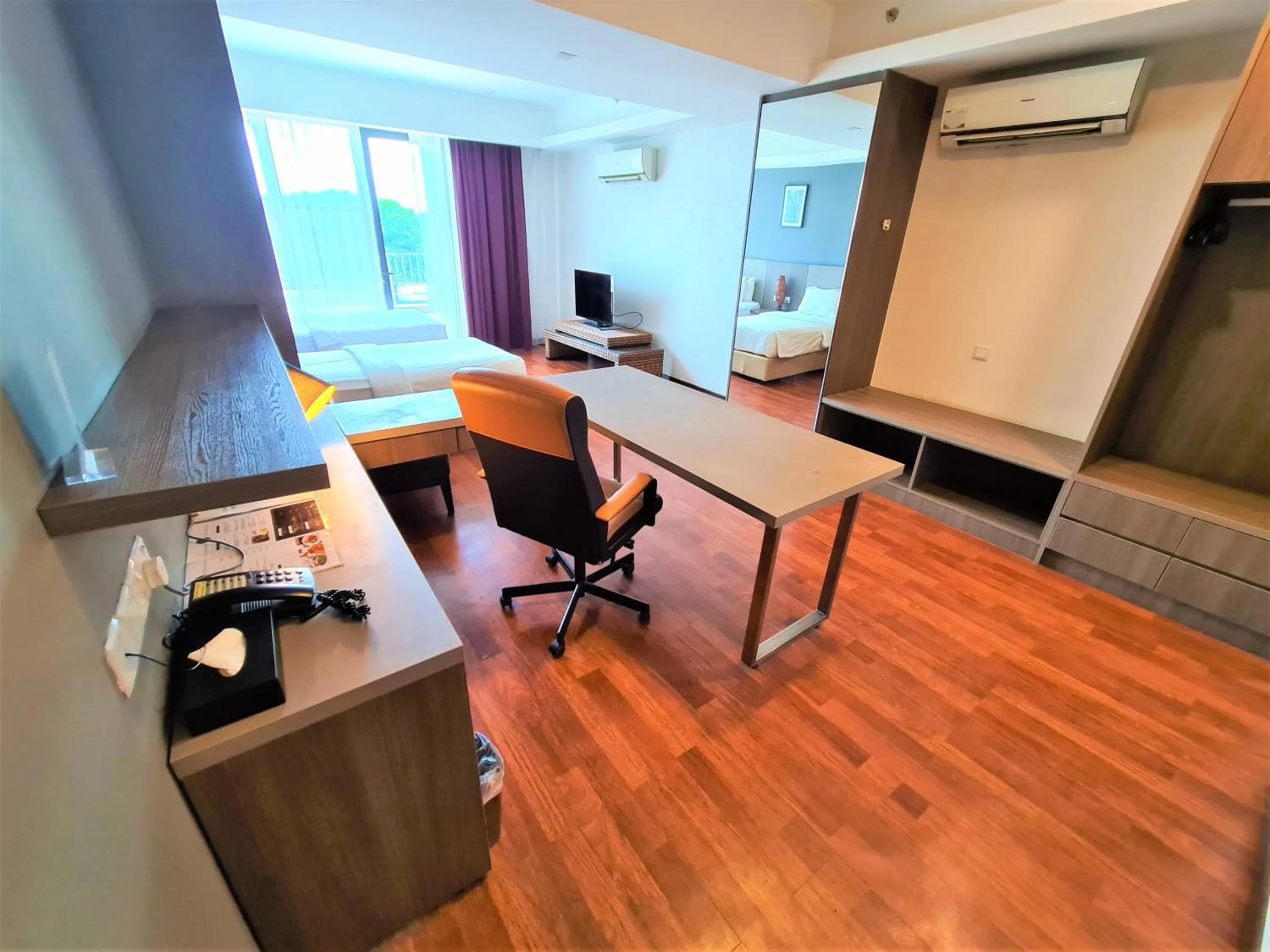 Seating area in Nexus Business Suite Hotel