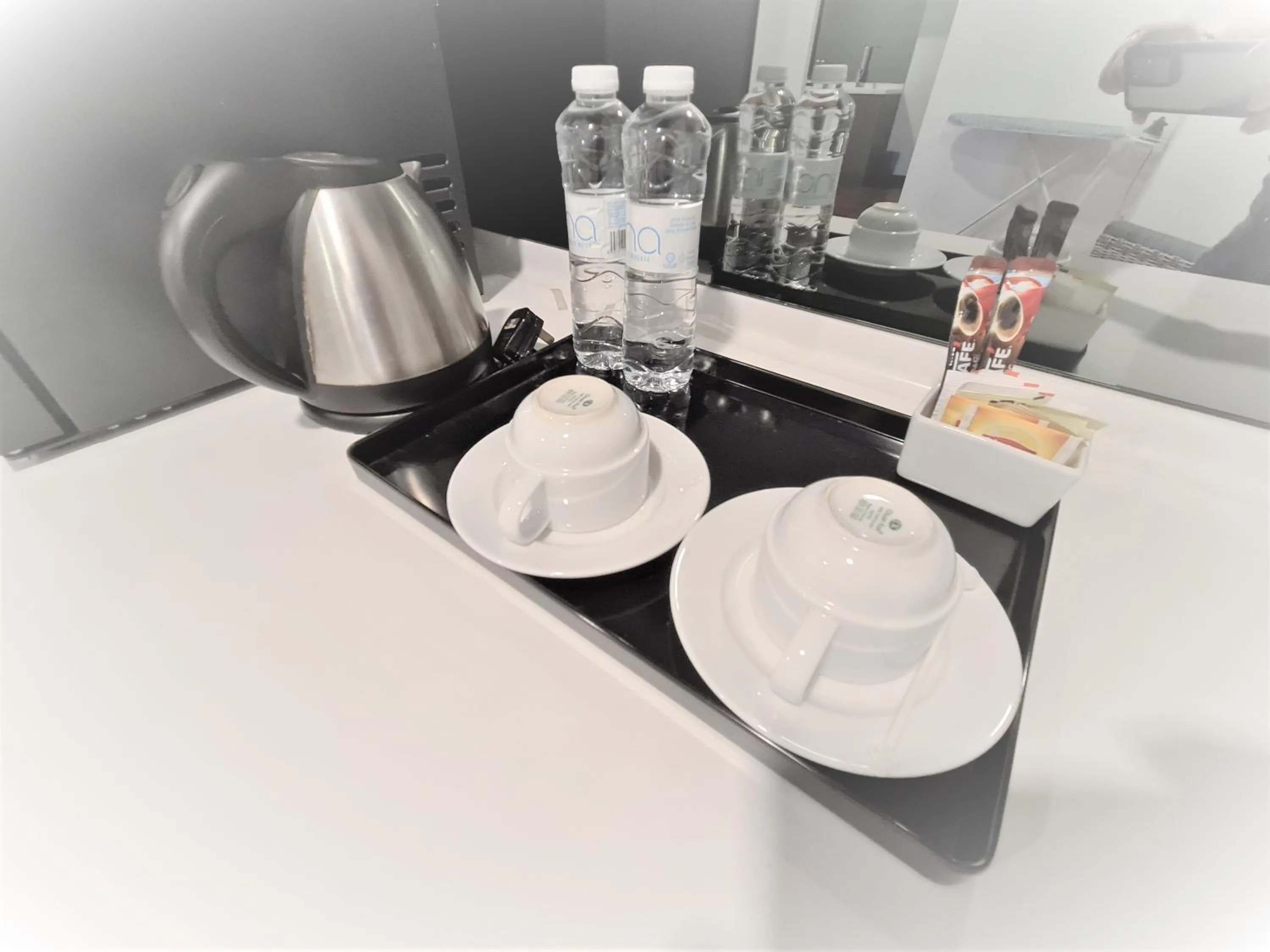 Kitchen or kitchenette in Nexus Business Suite Hotel