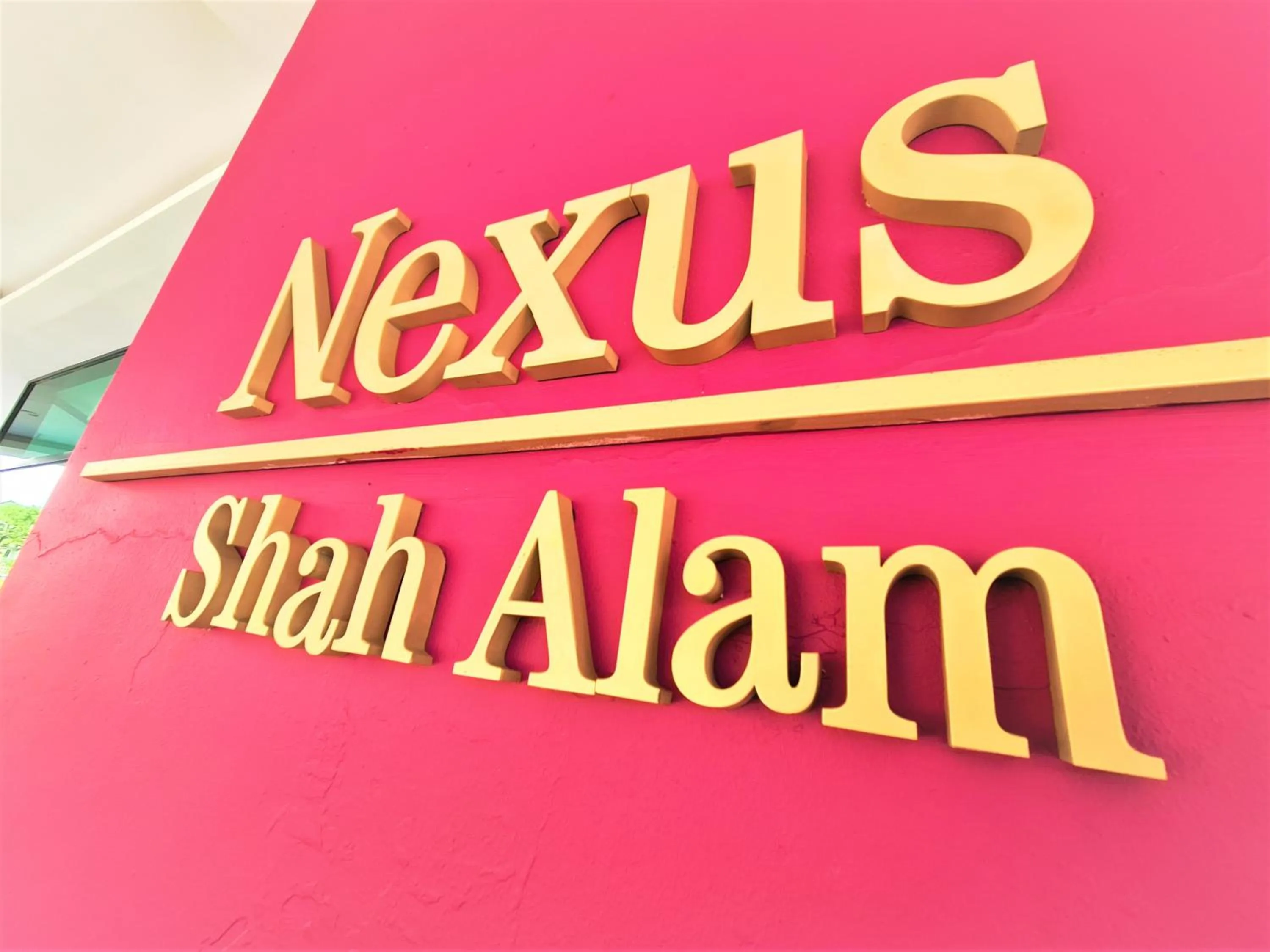 Property logo or sign in Nexus Business Suite Hotel