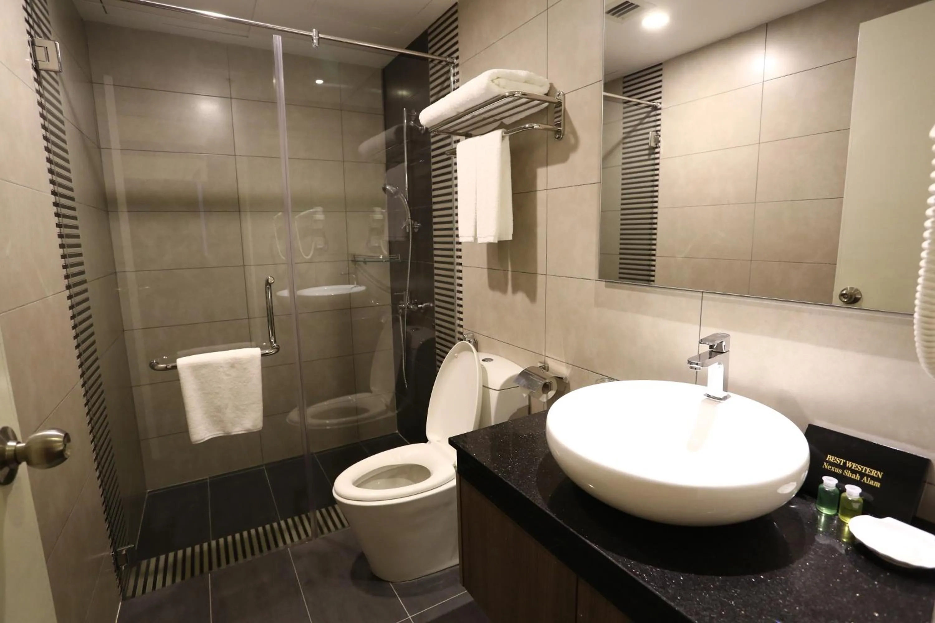 Bathroom in Nexus Business Suite Hotel