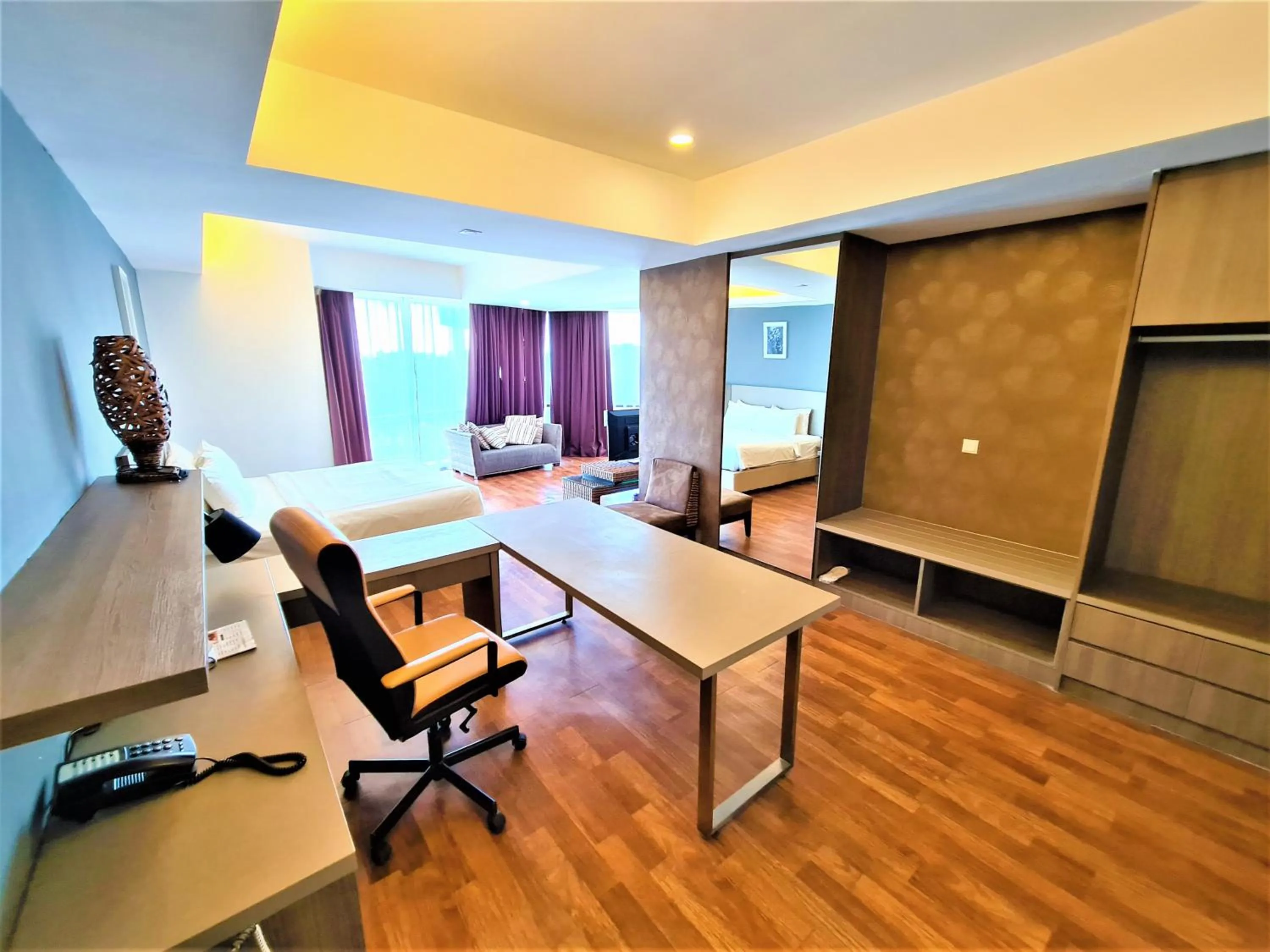 Seating area in Nexus Business Suite Hotel