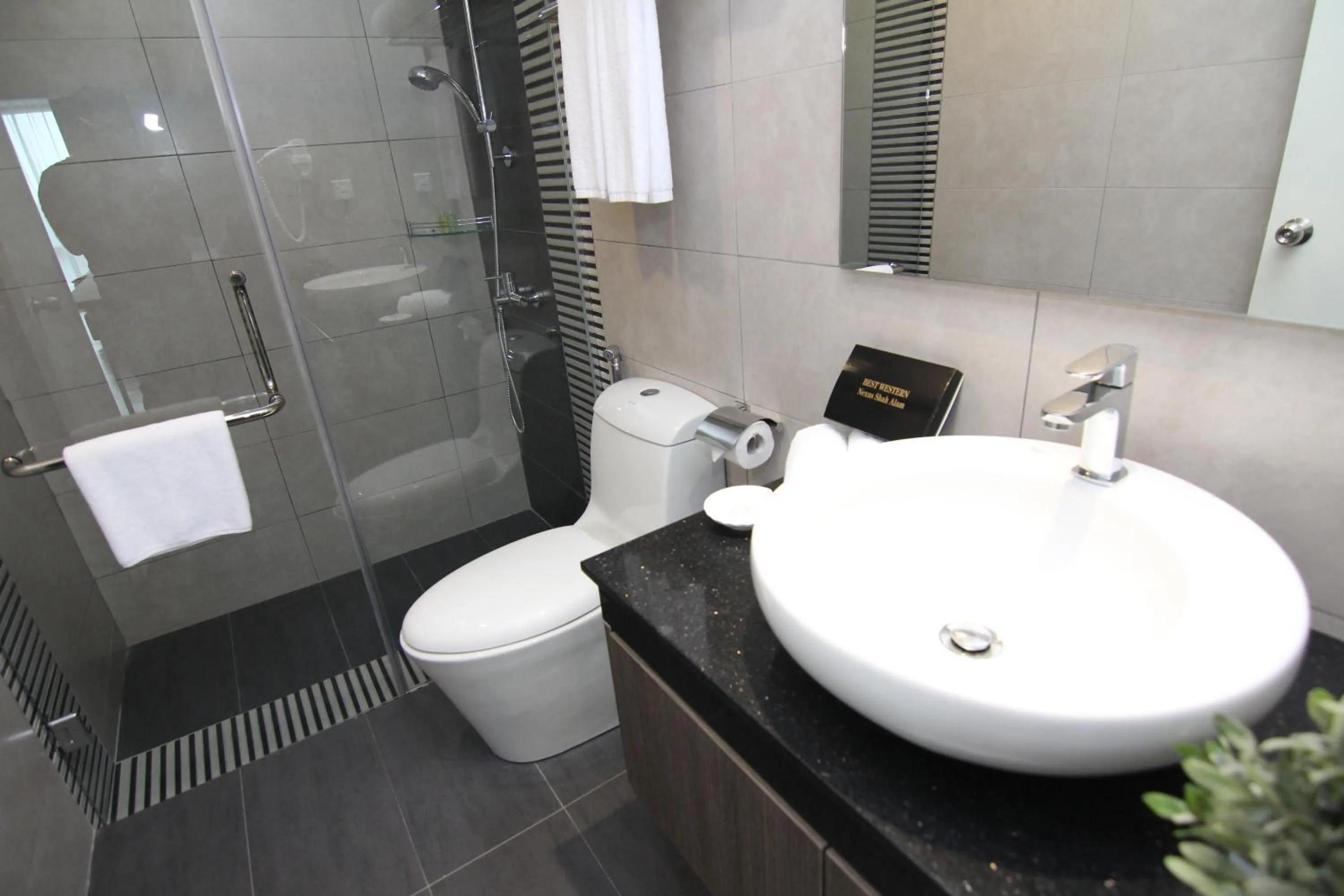 Bathroom in Nexus Business Suite Hotel