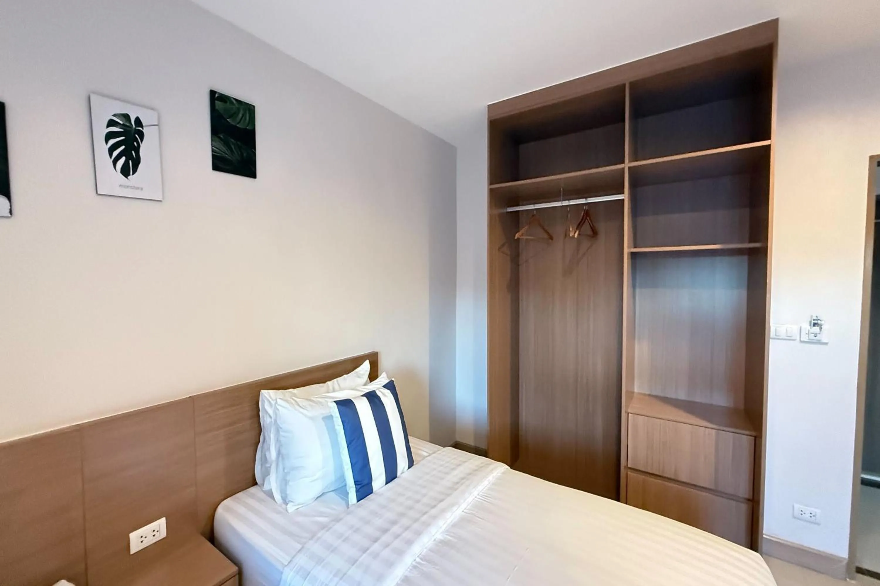 Photo of the whole room, Bed in SKM Paradise Mae Sai