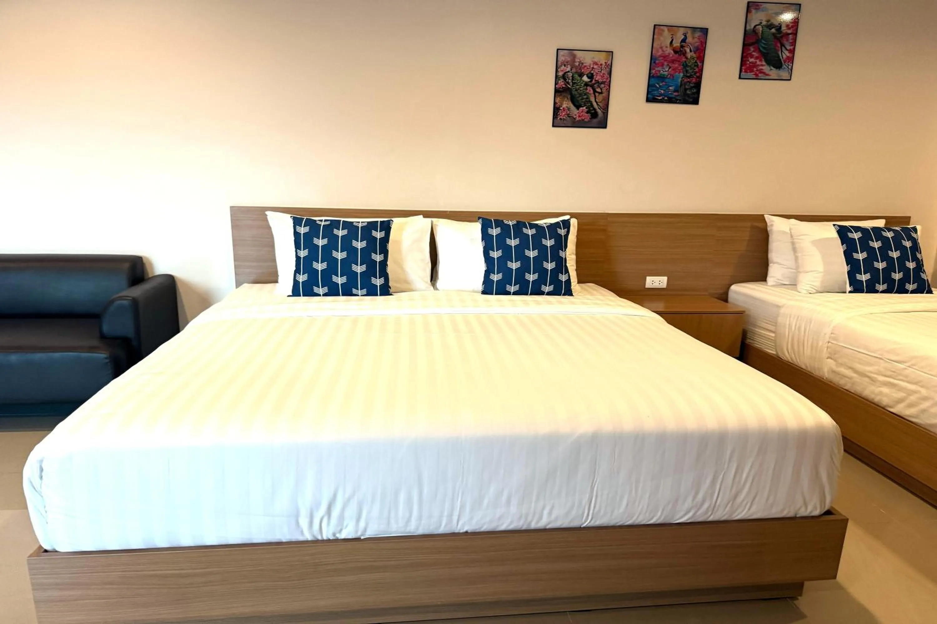 Photo of the whole room, Bed in SKM Paradise Mae Sai