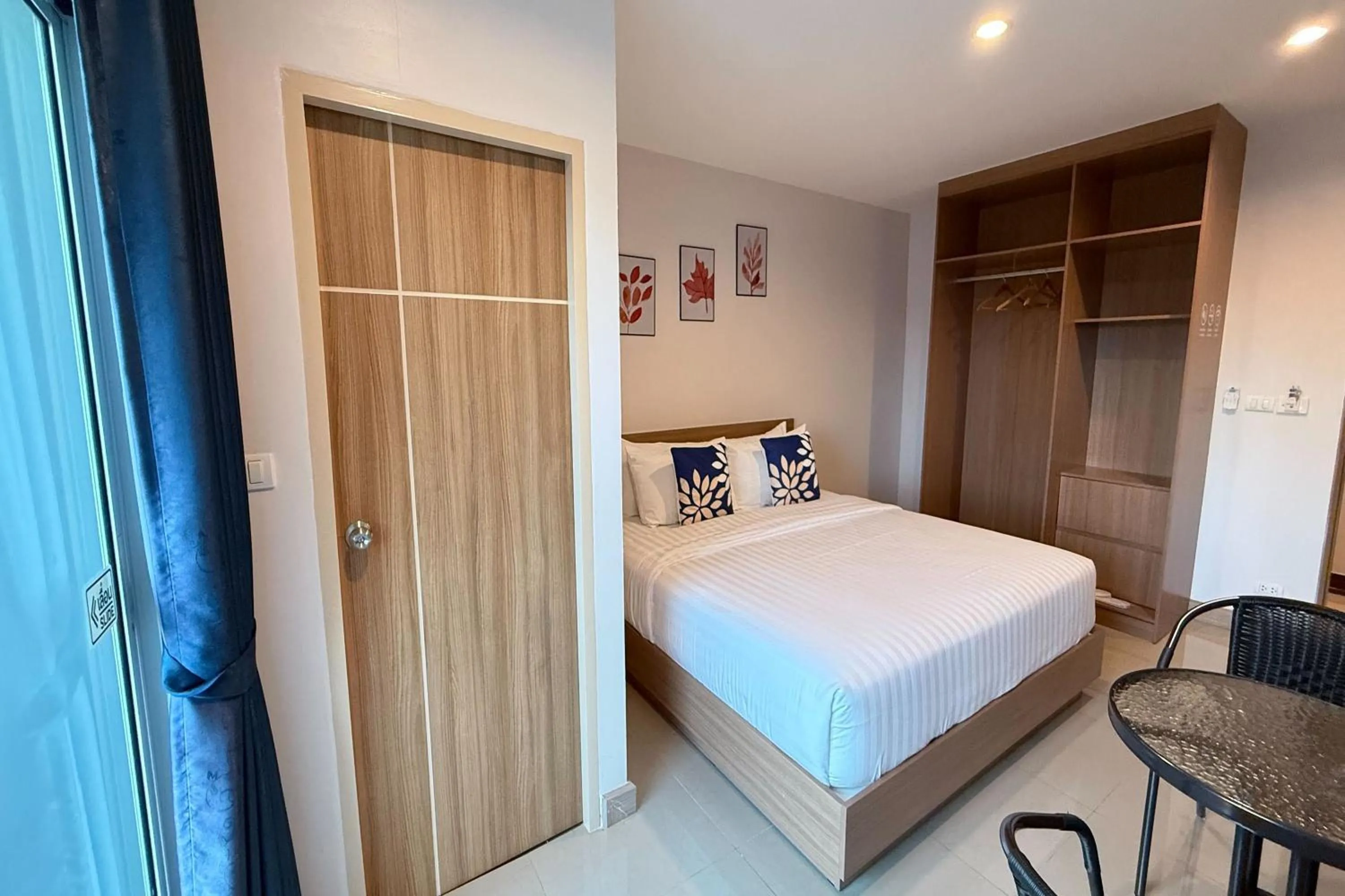 Photo of the whole room, Bed in SKM Paradise Mae Sai