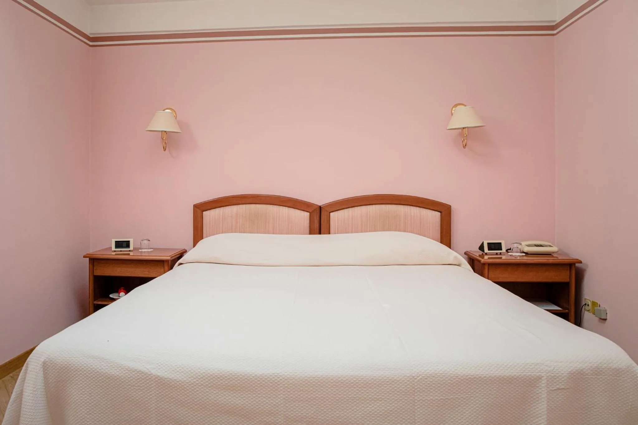 Bed in Hotel San Genesio