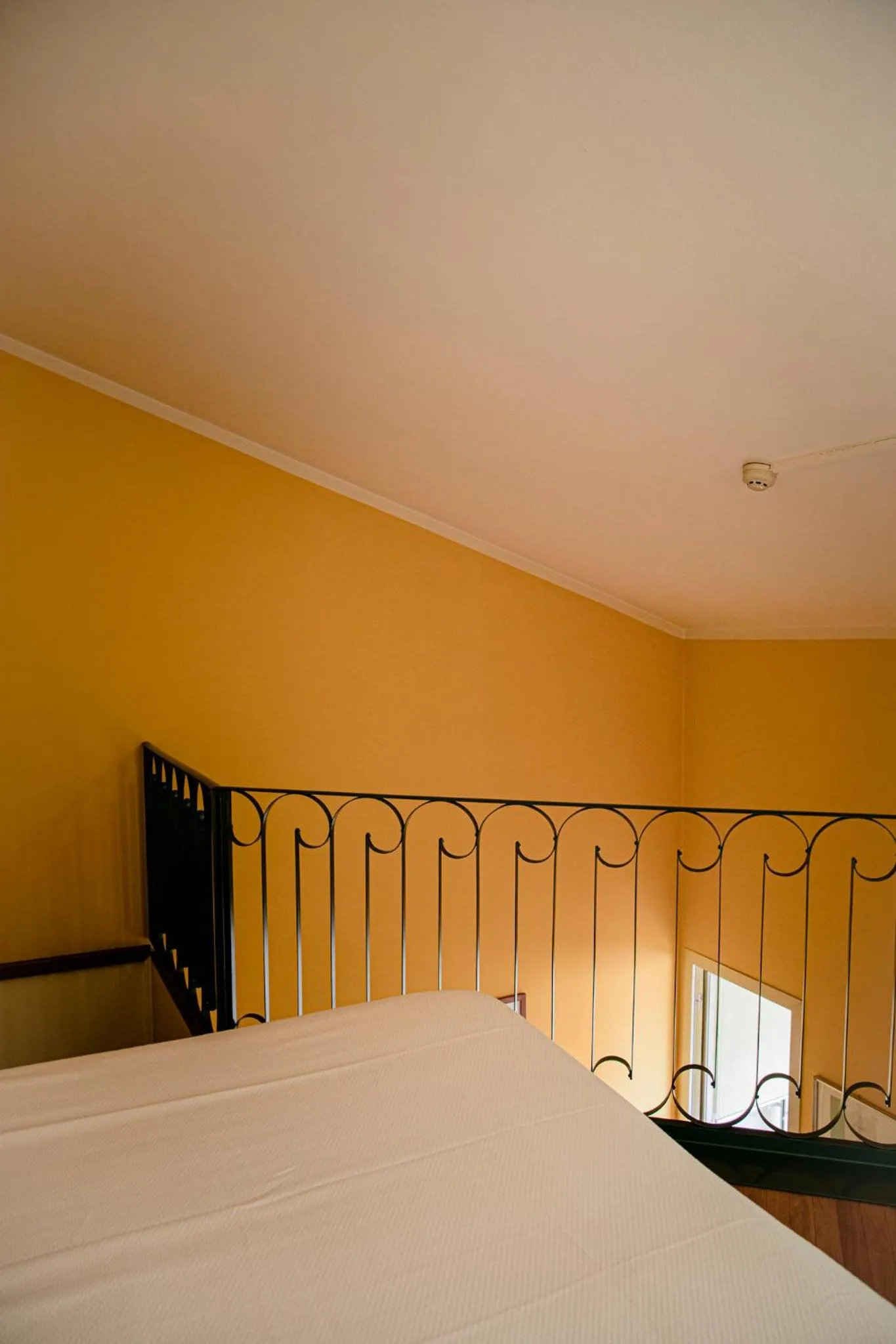 Bed in Hotel San Genesio