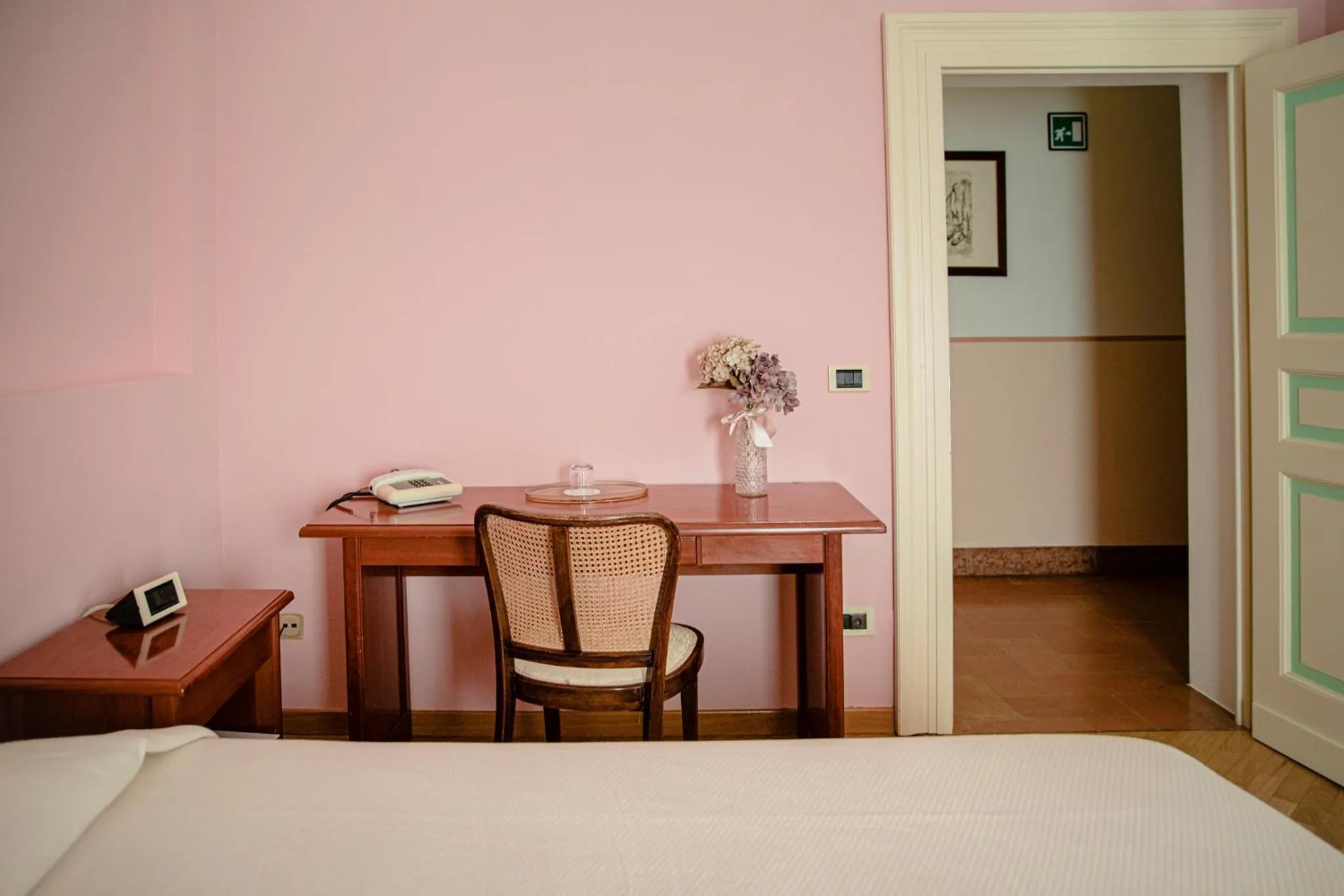 Bed in Hotel San Genesio