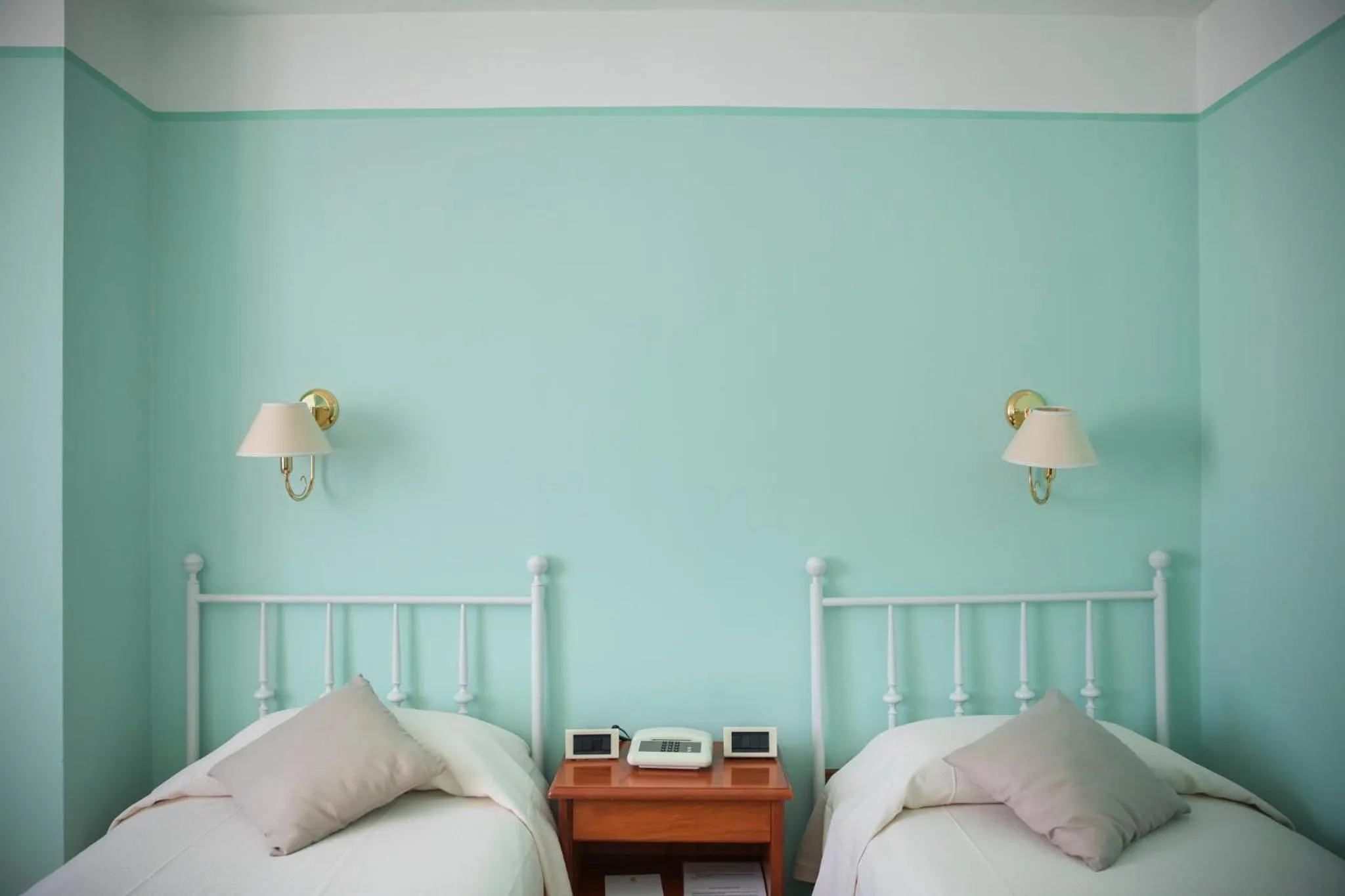 Bed in Hotel San Genesio