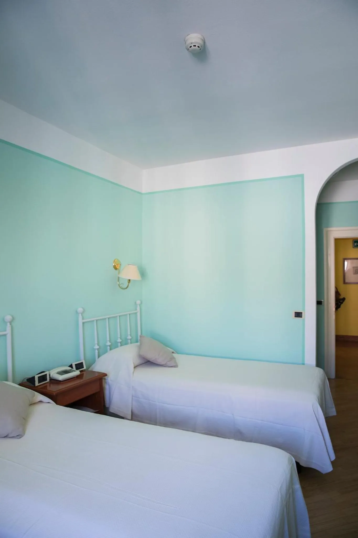 Bed in Hotel San Genesio