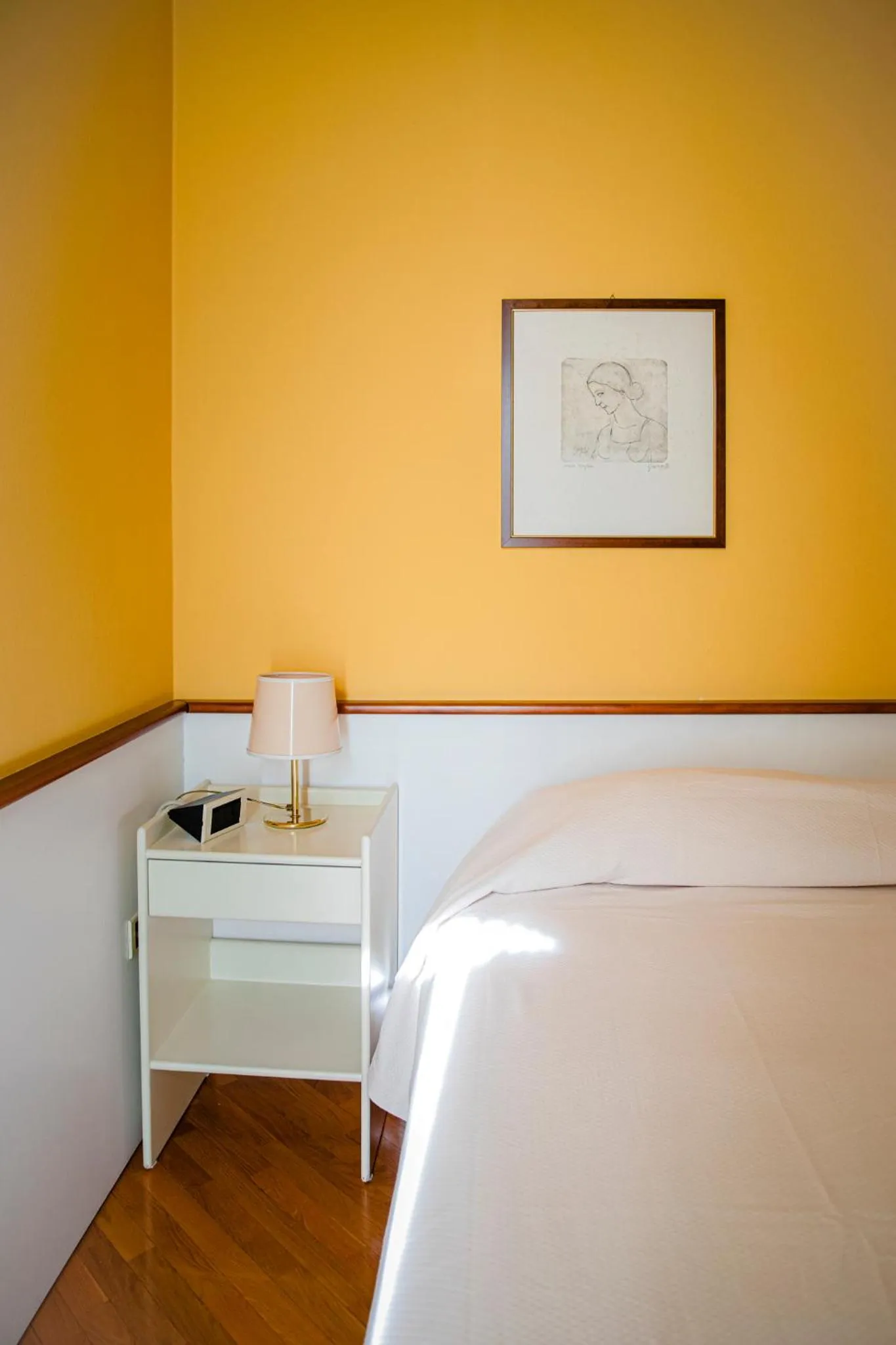 Bed in Hotel San Genesio