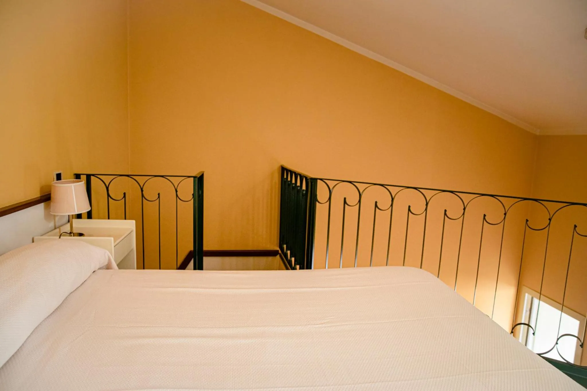 Bed in Hotel San Genesio