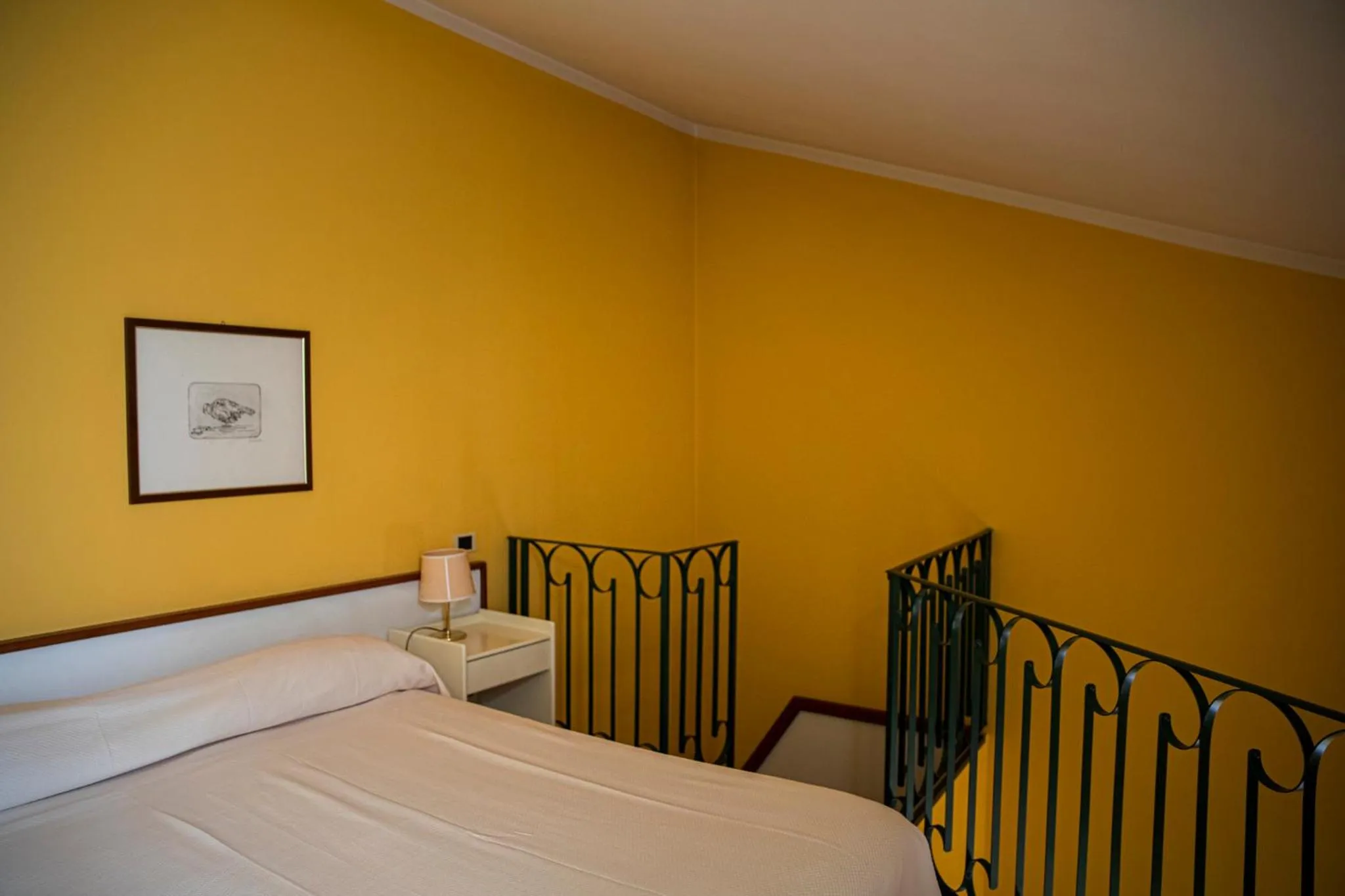 Bed in Hotel San Genesio