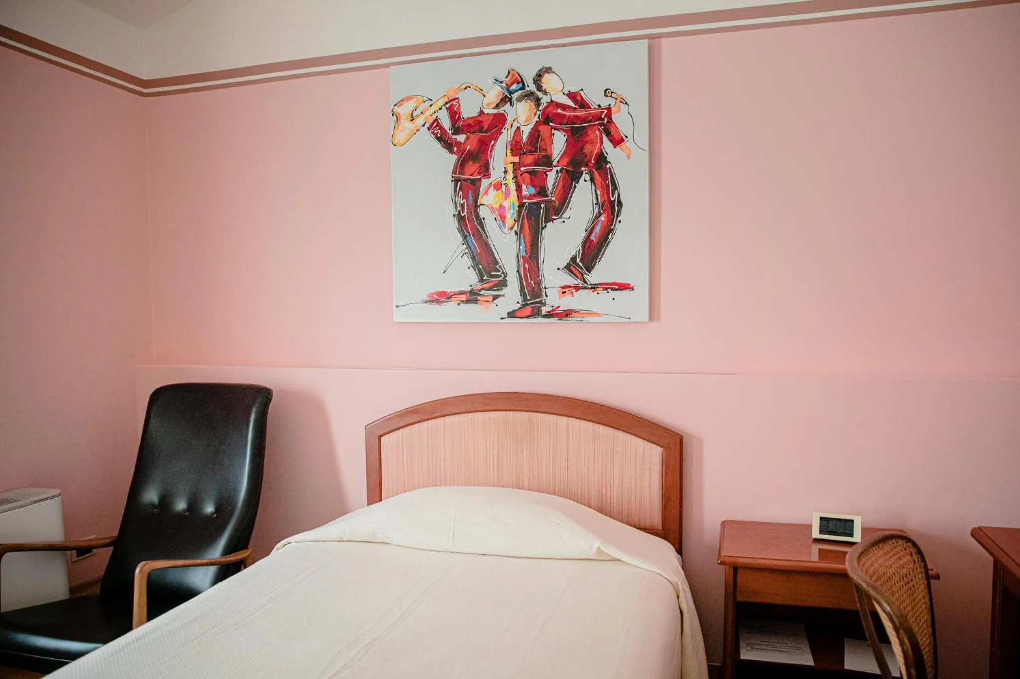 Bed in Hotel San Genesio