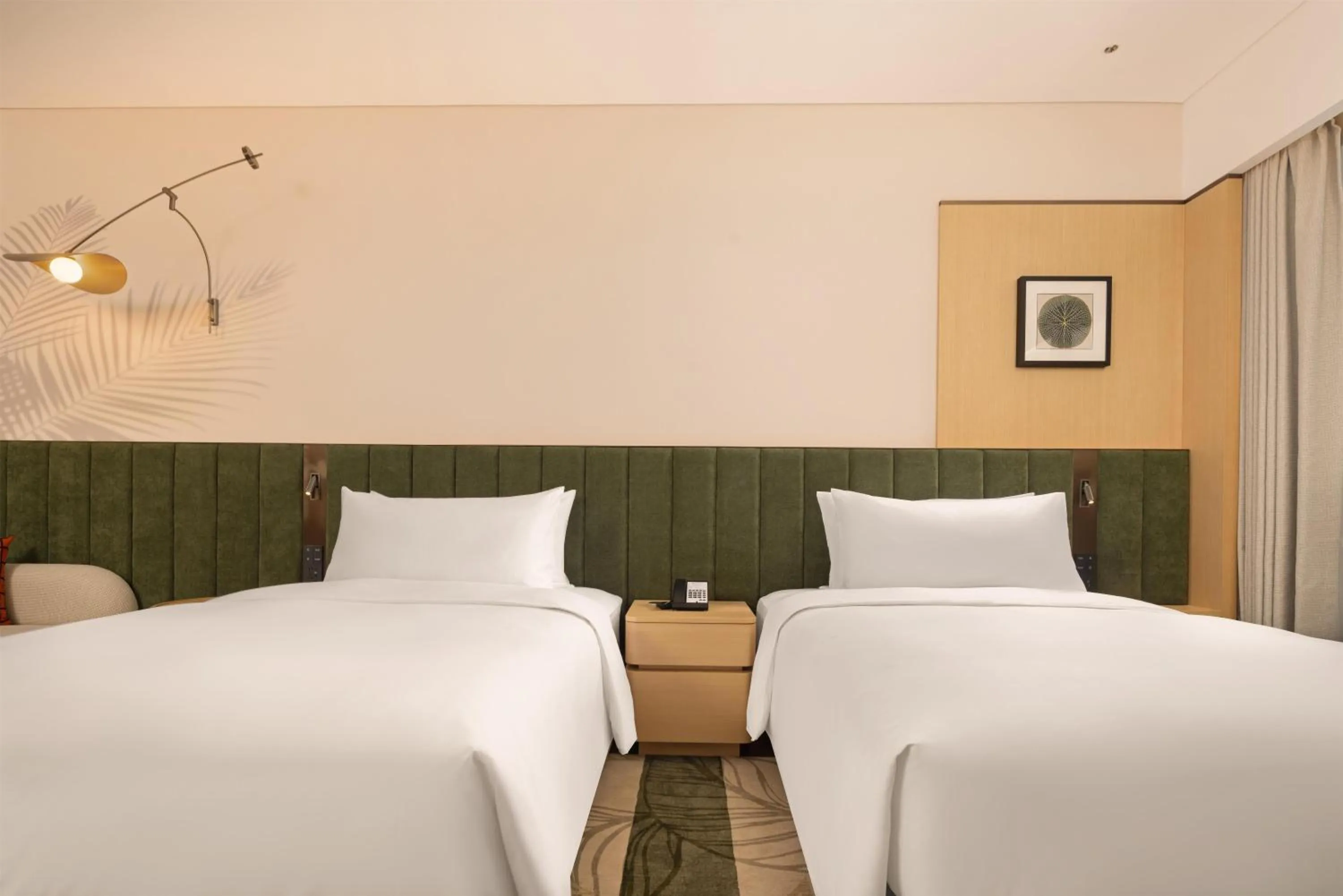 Bed in Hilton Garden Inn Xishuangbanna Gasa Airport