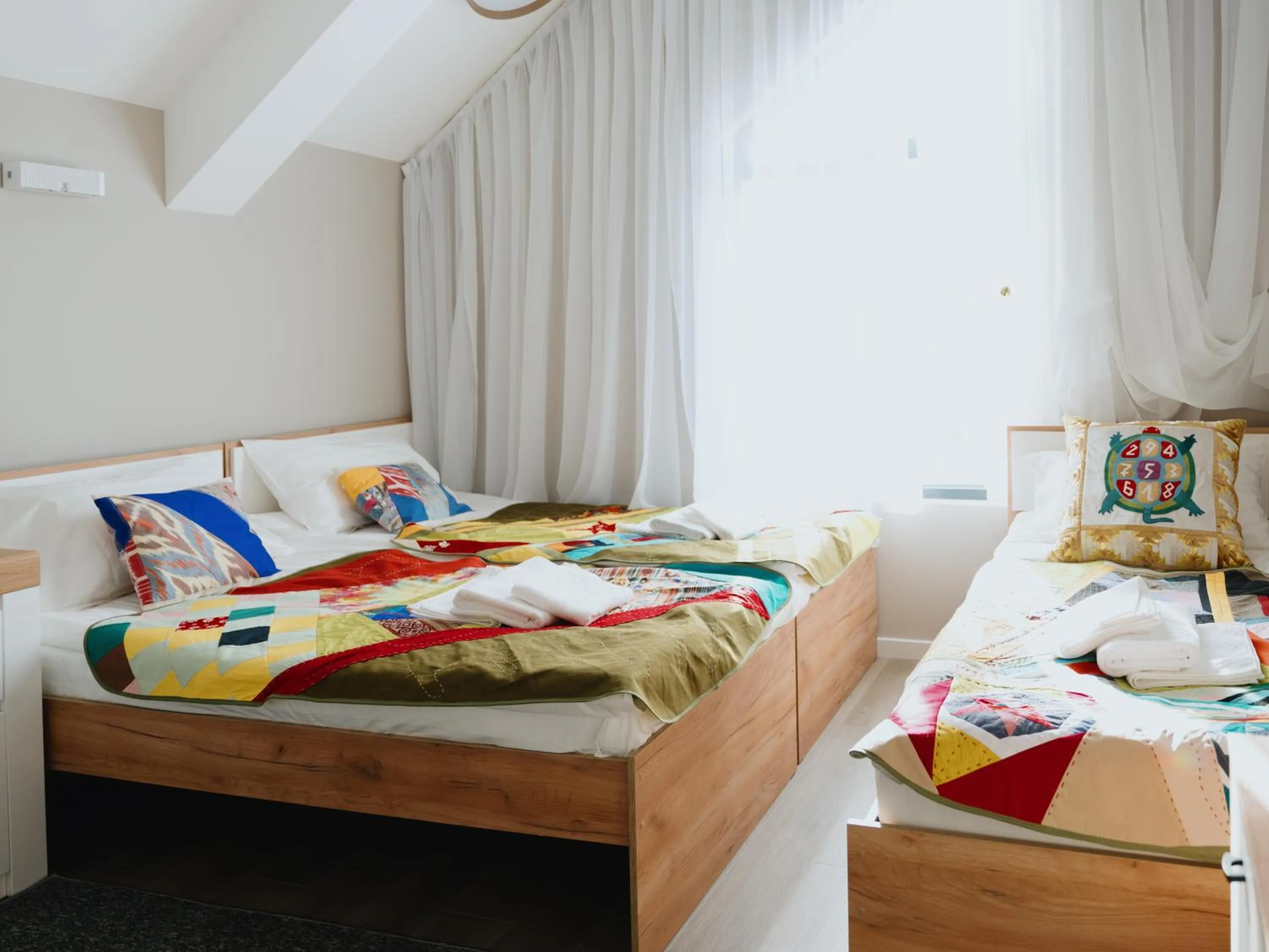 Bed in Skeramos Boutique Art Hotel