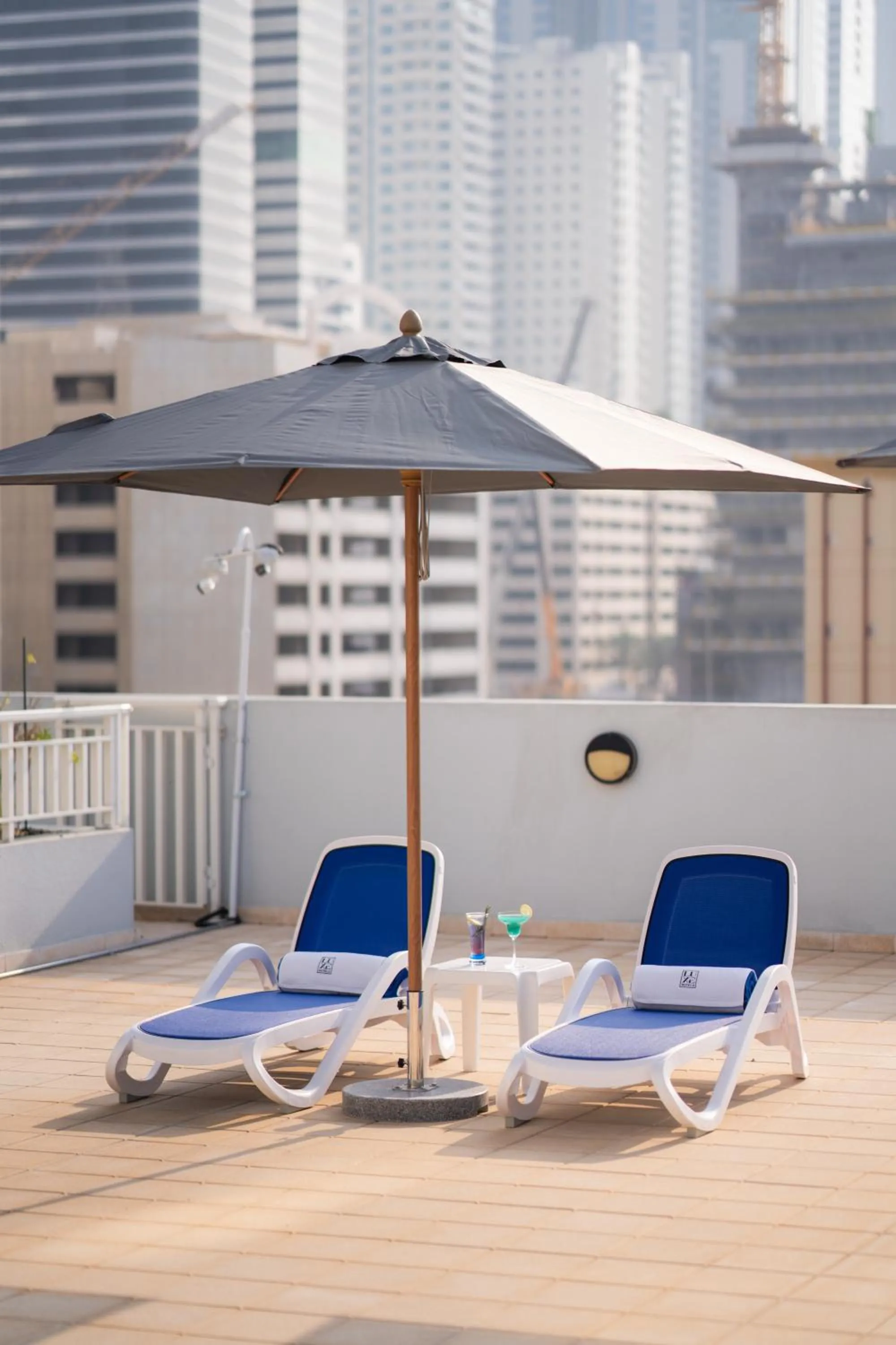 Swimming pool in The Luxe Retreat Hotel Apartments
