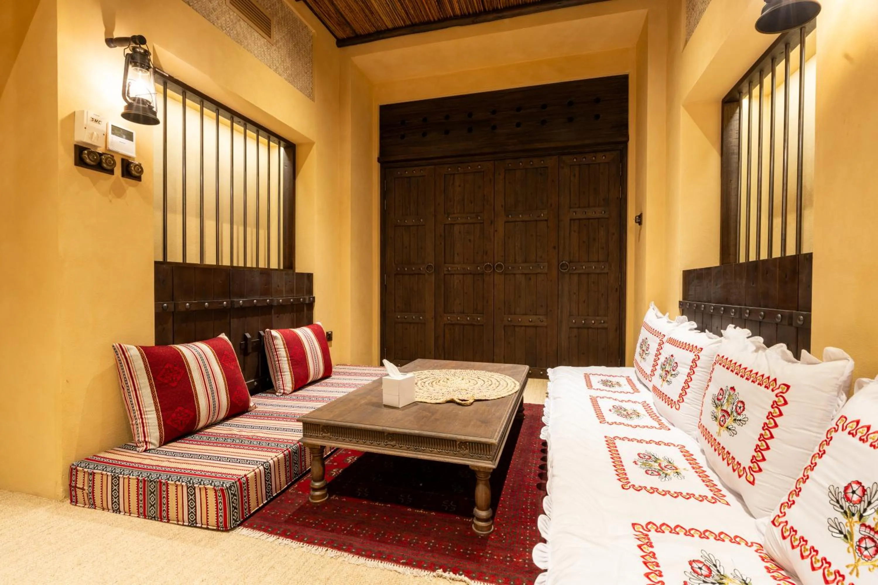 Seating area, Bed in The Luxe Retreat Hotel Apartments