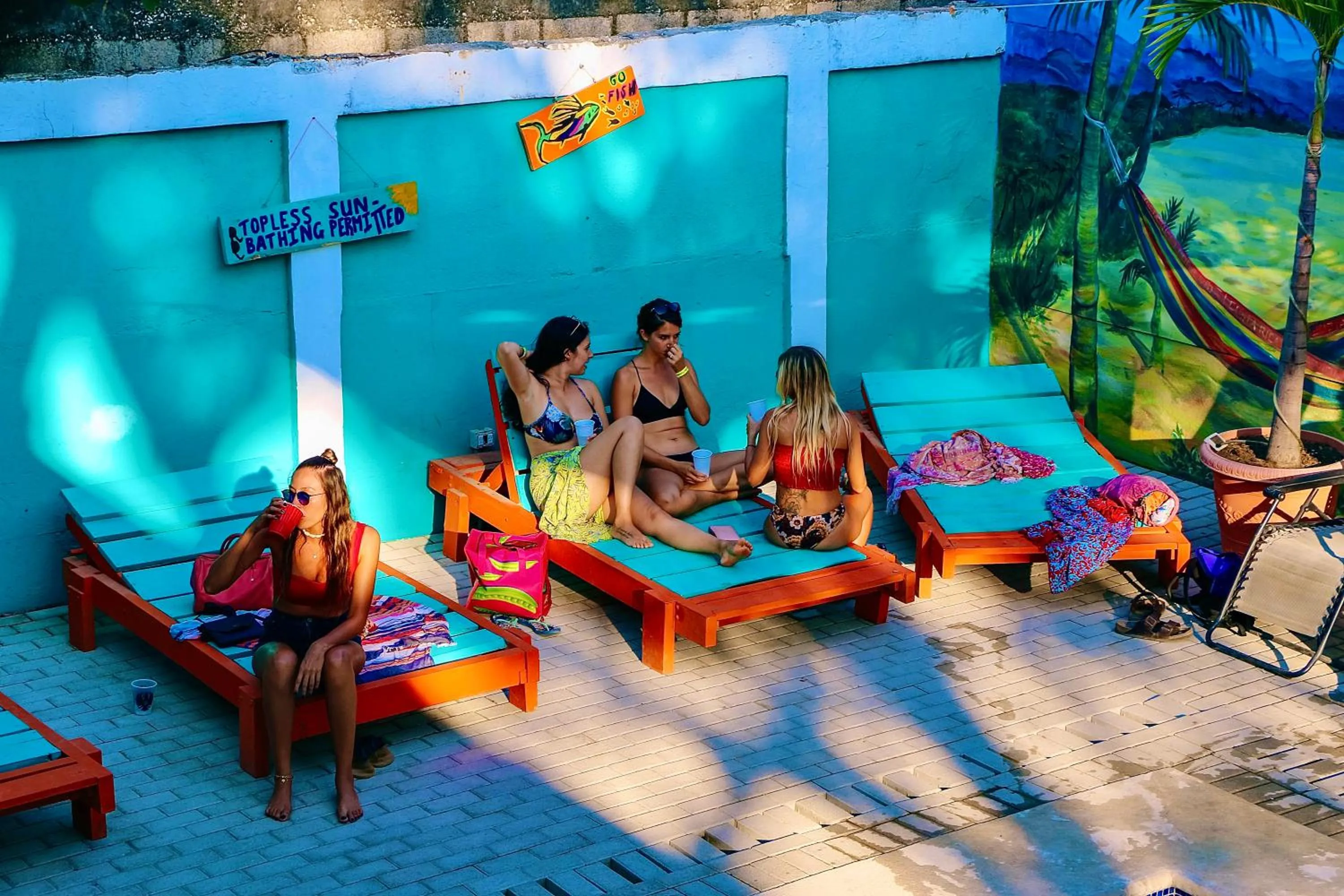 People in Blue Iguana