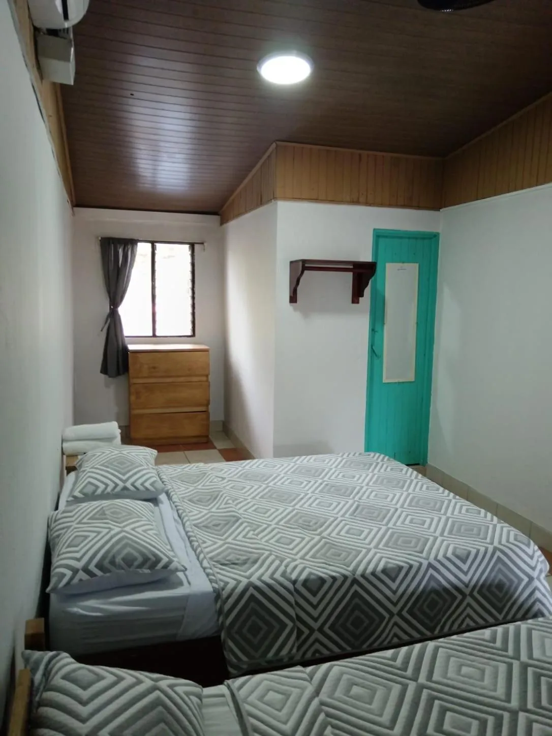 Photo of the whole room, Bed in Blue Iguana