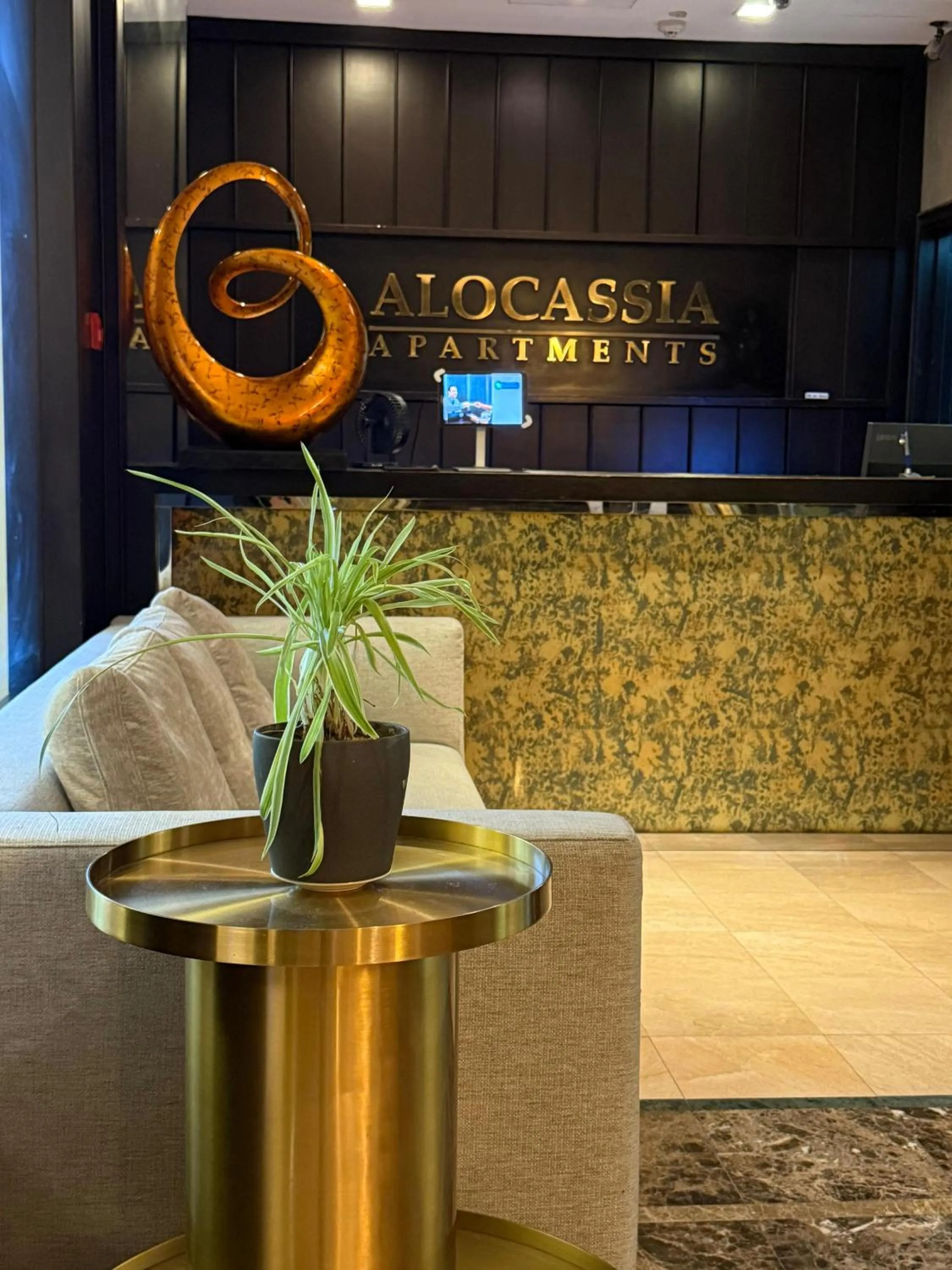 Property logo or sign in Alocassia Serviced Apartments