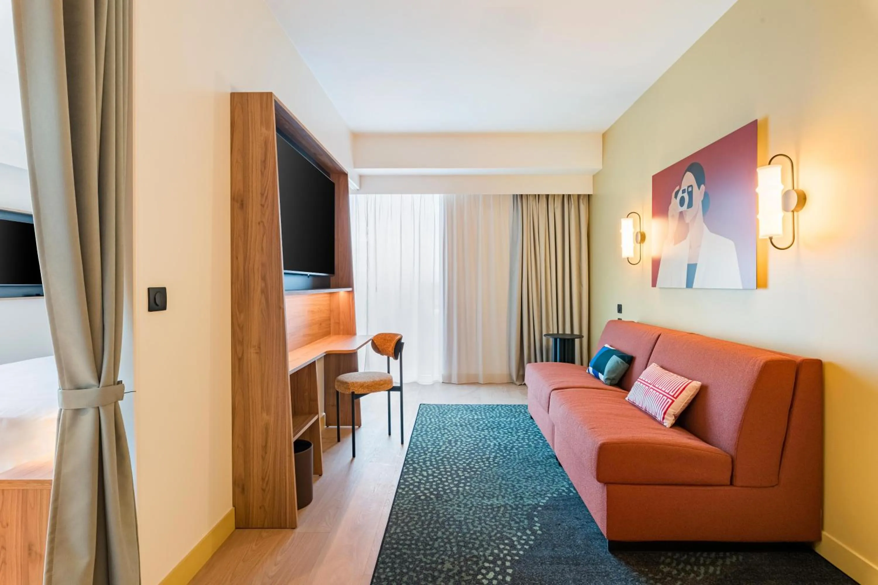 Living room in Hampton by Hilton Bordeaux Merignac Airport