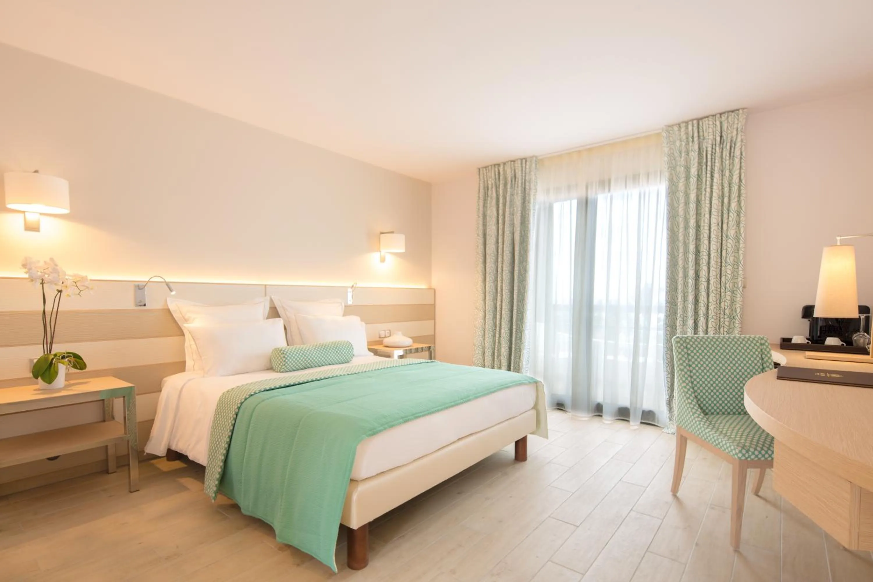 Bed in Akoya Hotel & Spa