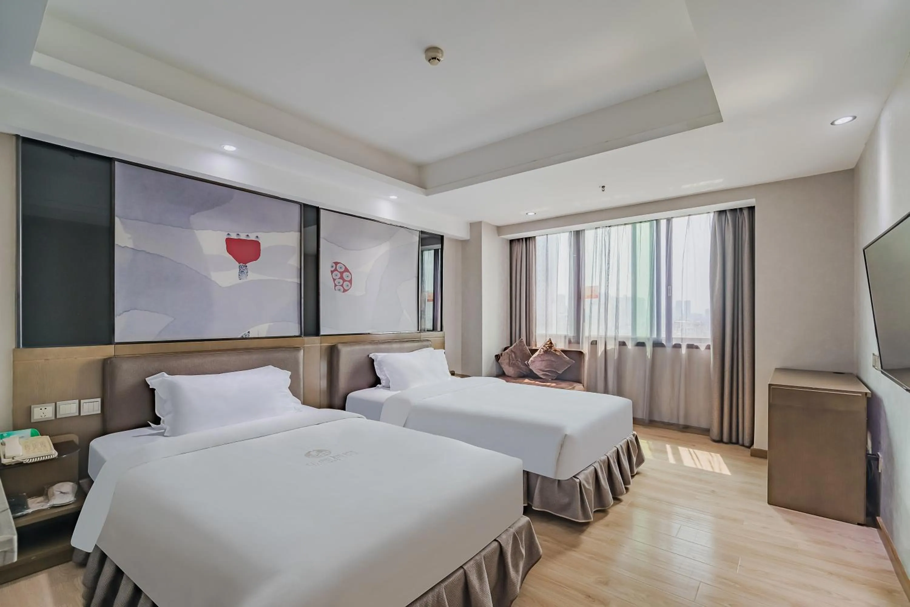 Photo of the whole room, Bed in Insail Hotels (Pazhou Exhibition Center KeCun Metro Station Dunhe Road Branch Guangzhou)