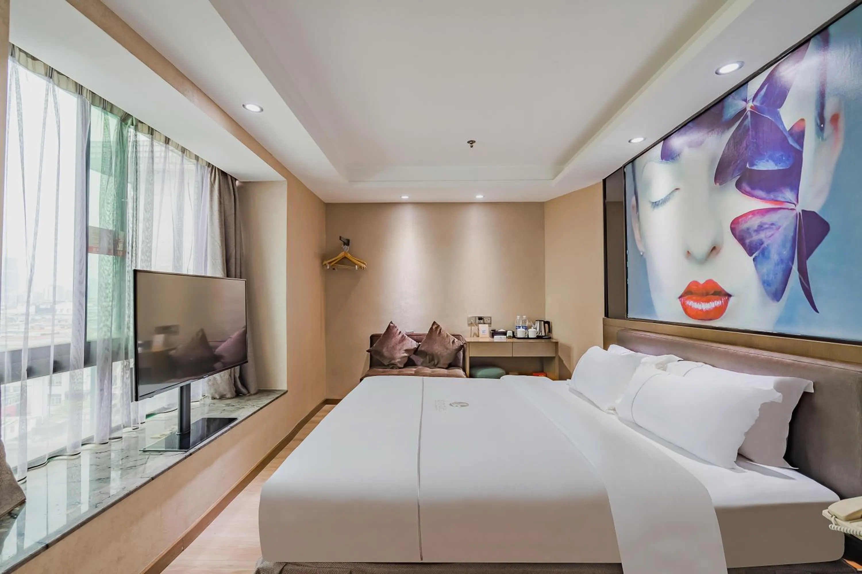 Photo of the whole room, Bed in Insail Hotels (Pazhou Exhibition Center KeCun Metro Station Dunhe Road Branch Guangzhou)