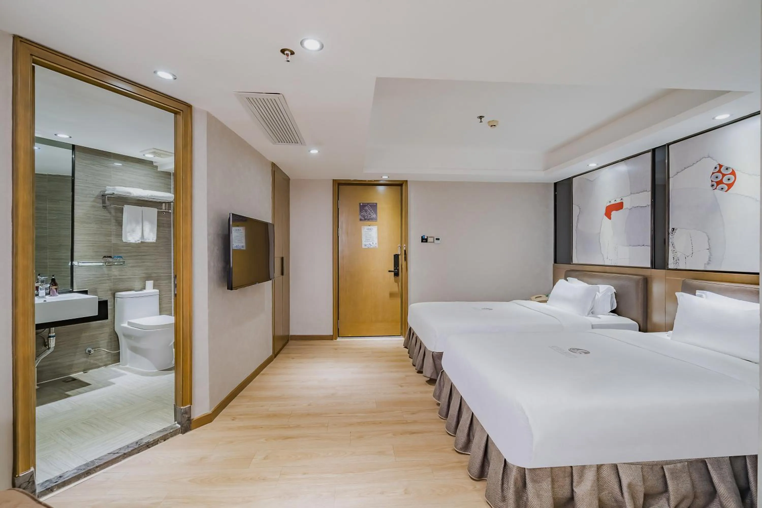 Photo of the whole room, Bed in Insail Hotels (Pazhou Exhibition Center KeCun Metro Station Dunhe Road Branch Guangzhou)