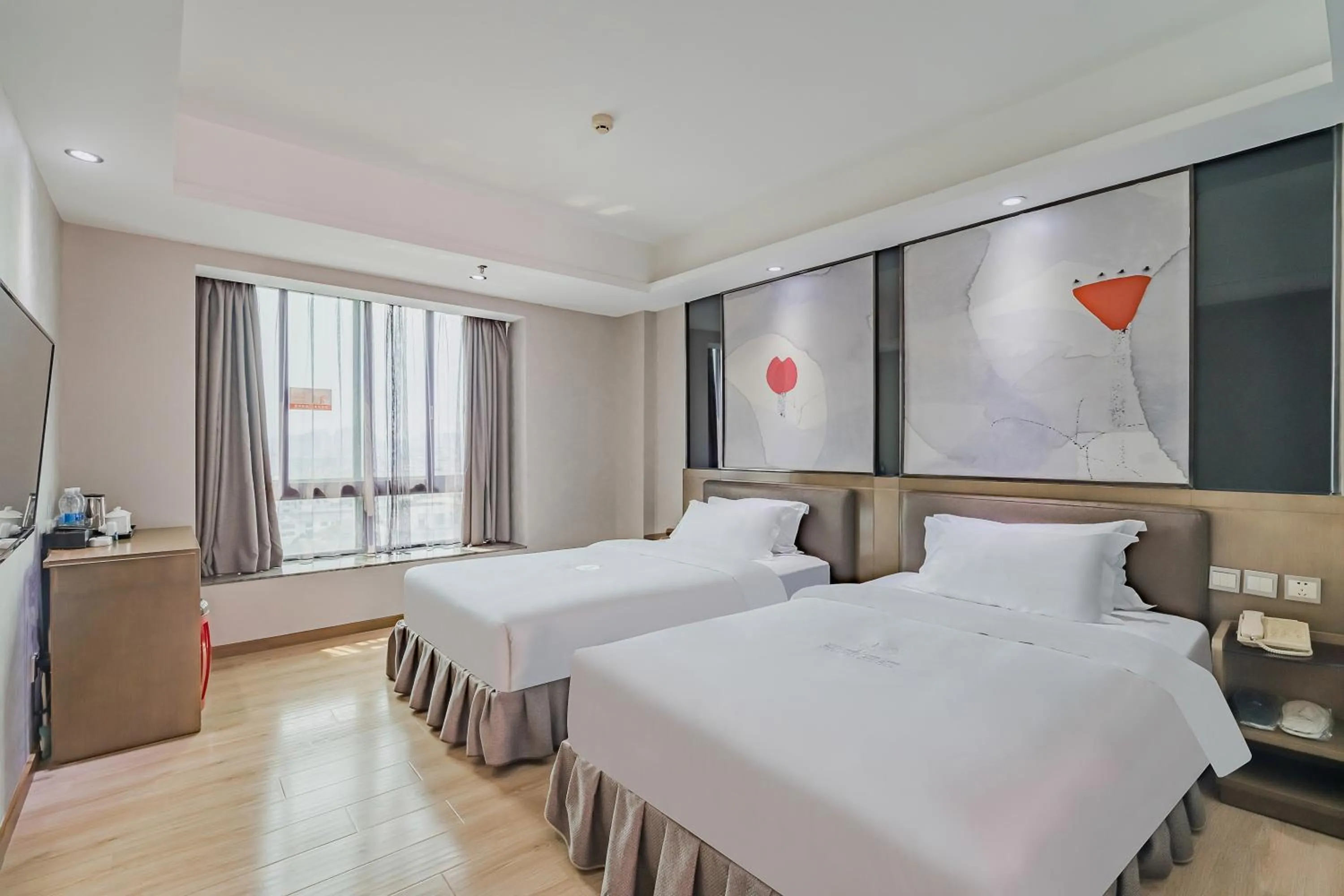 Photo of the whole room, Bed in Insail Hotels (Pazhou Exhibition Center KeCun Metro Station Dunhe Road Branch Guangzhou)