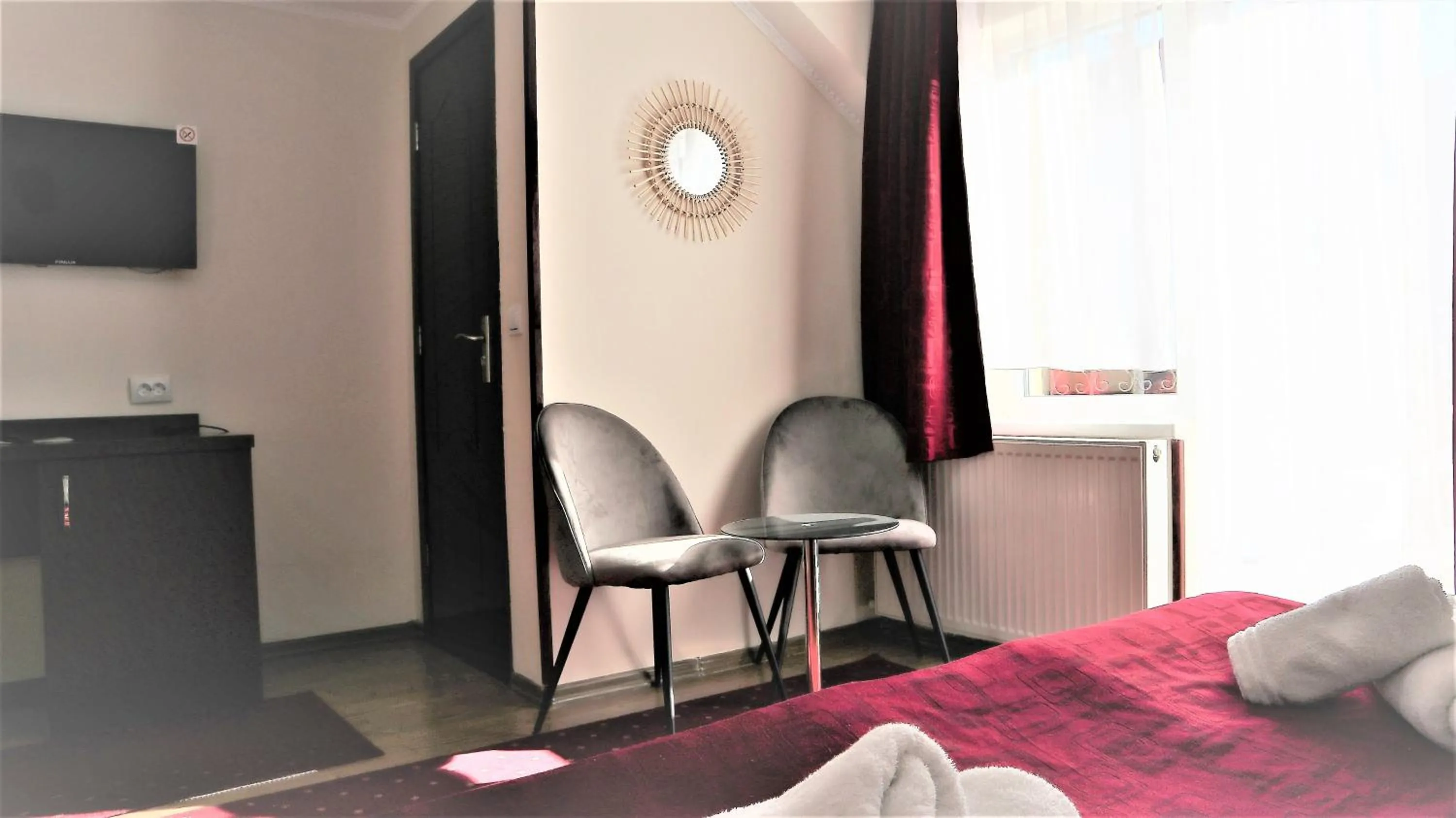 Seating area, Bed in Pensiunea Magnolia