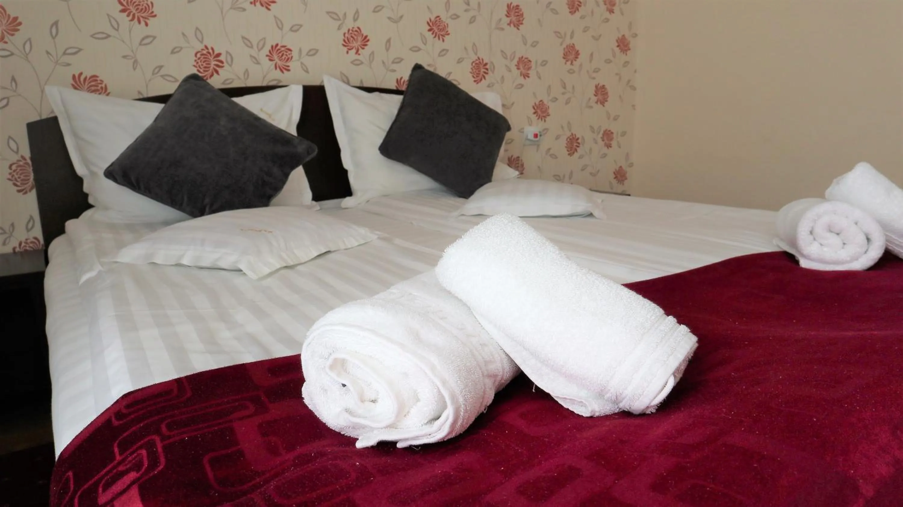 Photo of the whole room, Bed in Pensiunea Magnolia