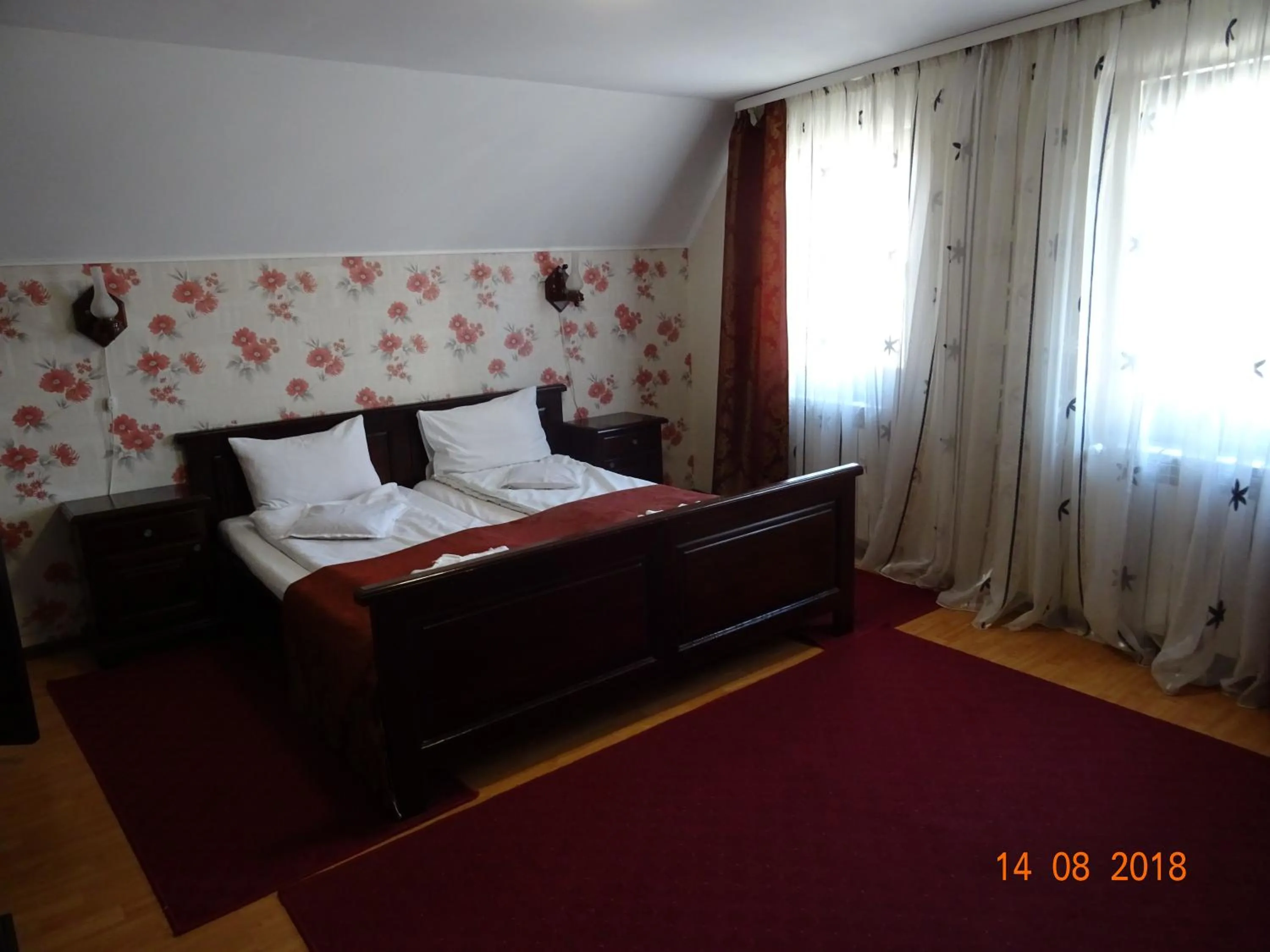 Photo of the whole room, Bed in Pensiunea Magnolia