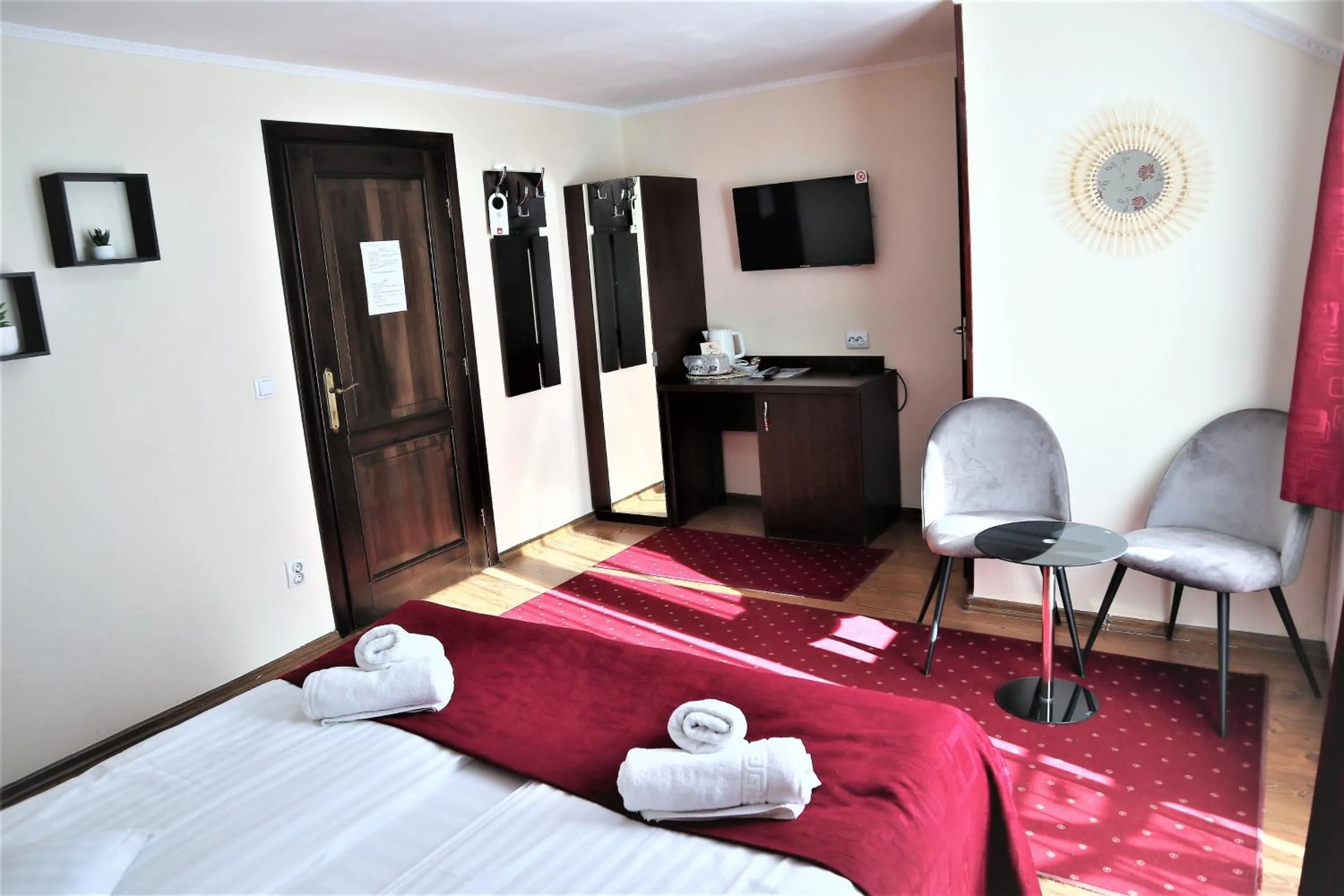 Photo of the whole room, Bed in Pensiunea Magnolia