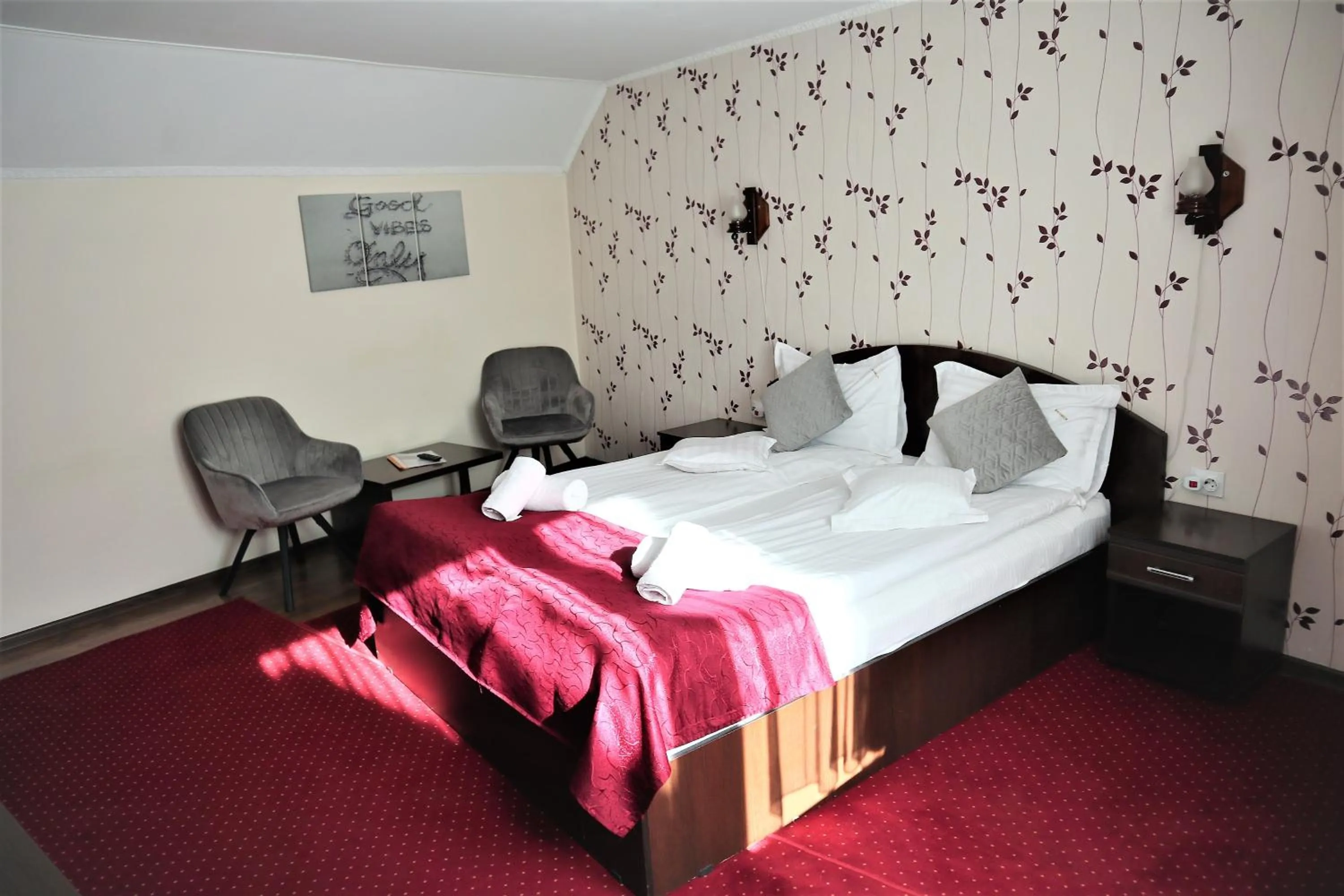 Photo of the whole room, Bed in Pensiunea Magnolia