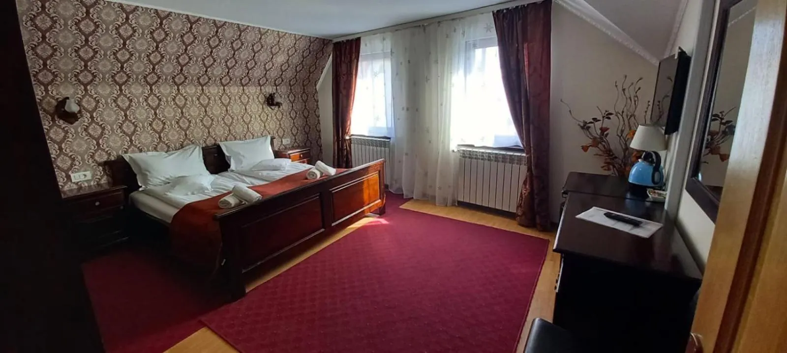 Photo of the whole room, Bed in Pensiunea Magnolia