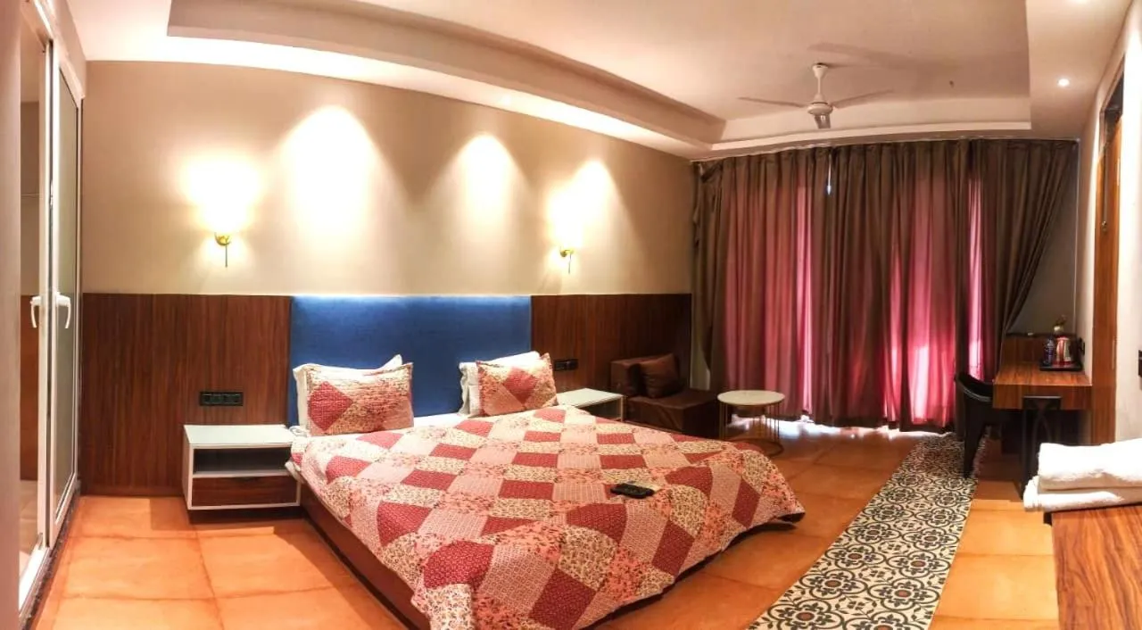 Bed in Eutopia Beach Resort